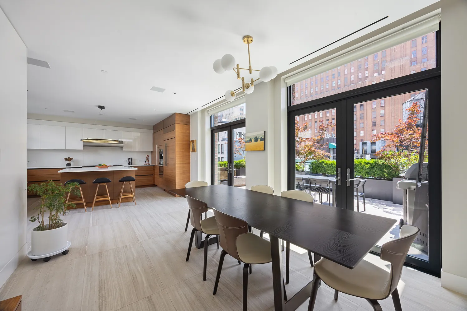 a dining room with furniture window and wooden floor