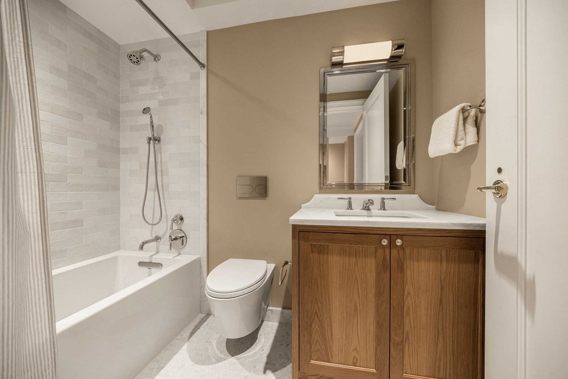 118 West 13th Street, Unit 4 Manhattan, NY 10011 - Photo 16 of 21 a bathroom with a sink a toilet and shower