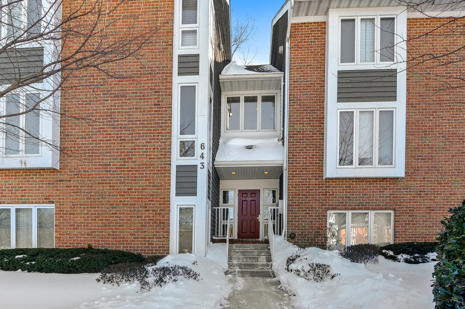 a front view of a building with a outdoor space