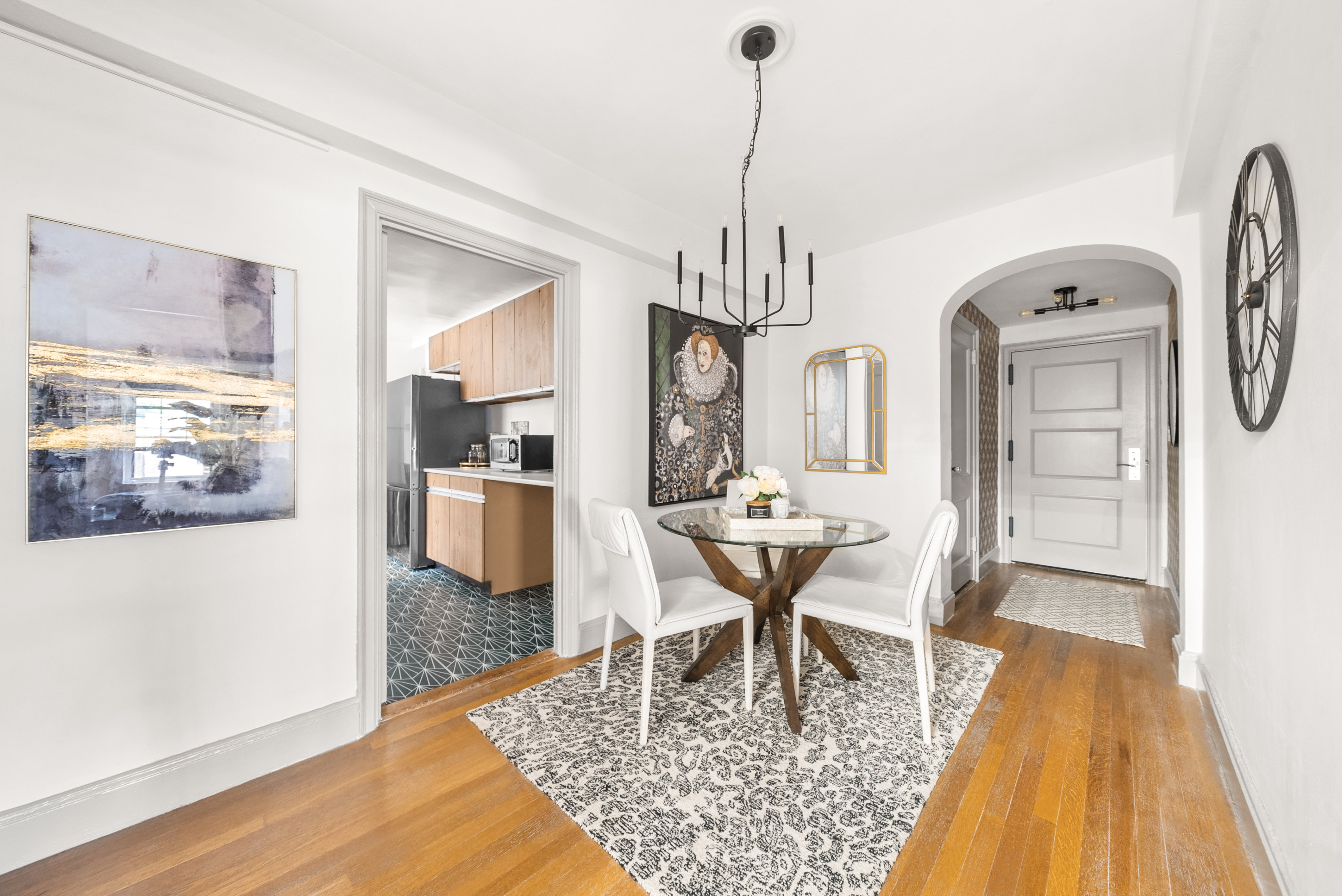 12 East 88th Street, Unit 9C Manhattan, NY 10128 - Photo 4 of 9 a view of a dining room and livingroom view