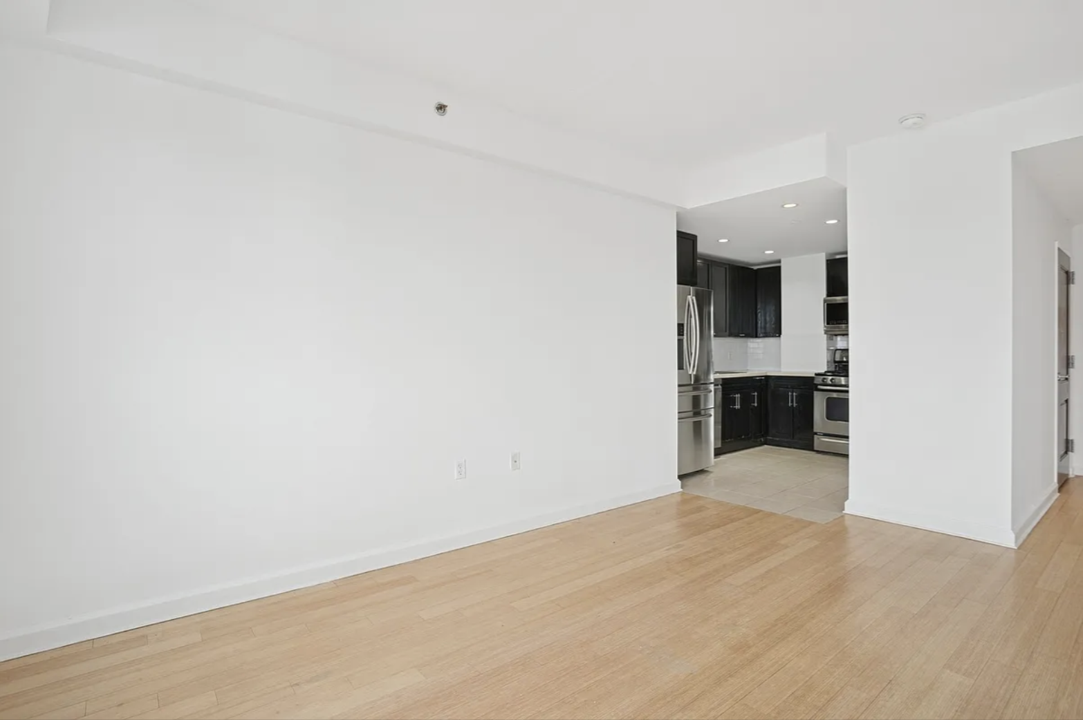 145 Park Place, Unit 4E Brooklyn, NY 11217 - Photo 4 of 15 wooden floor in an empty room