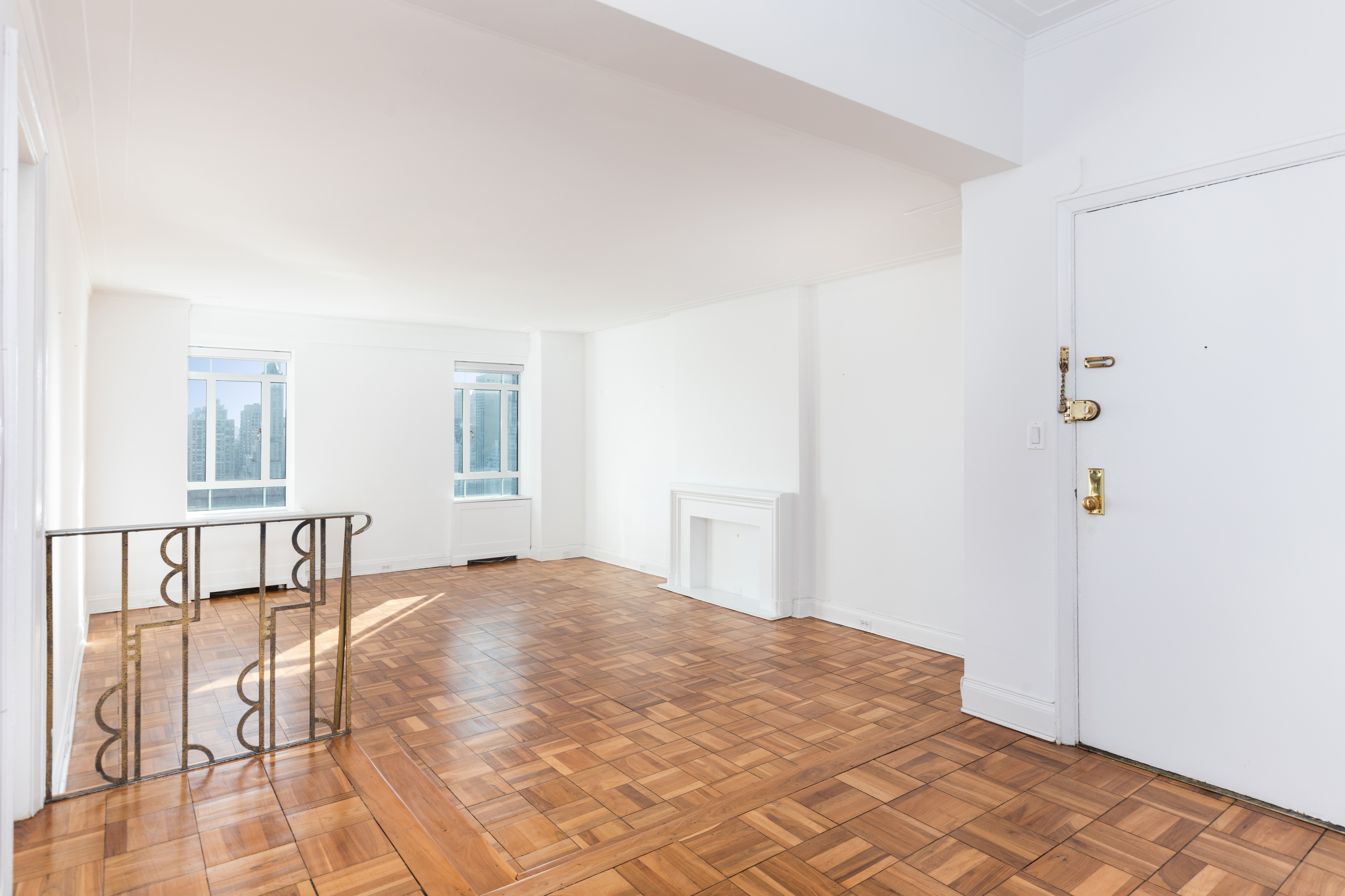 25 Central Park West, Unit 25K Manhattan, NY 10023 - Photo 3 of 14 a bedroom with a bed and a table