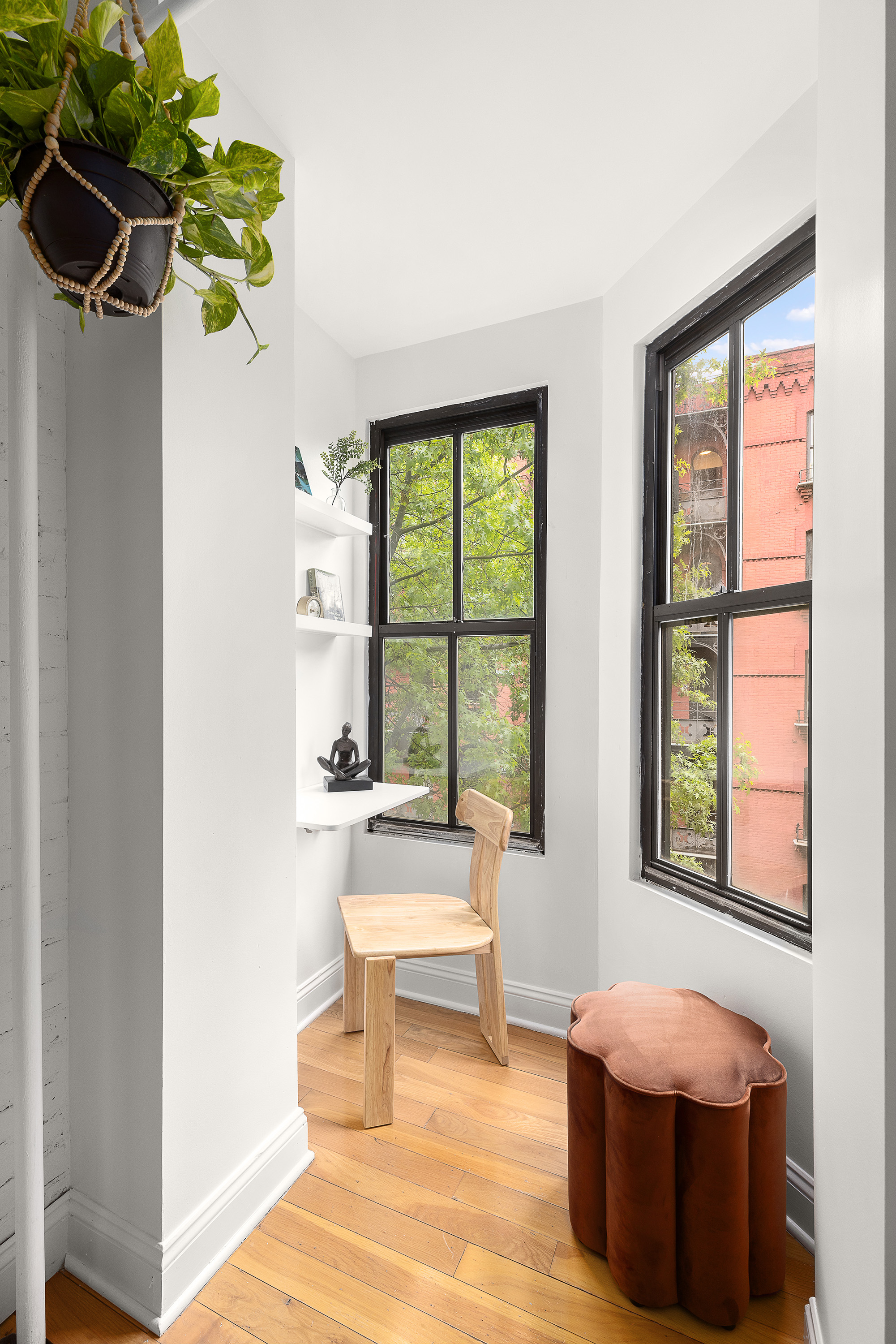 138 Baltic Street, Unit 4C Brooklyn, NY 11201 - Photo 6 of 12 a living room with furniture and a window