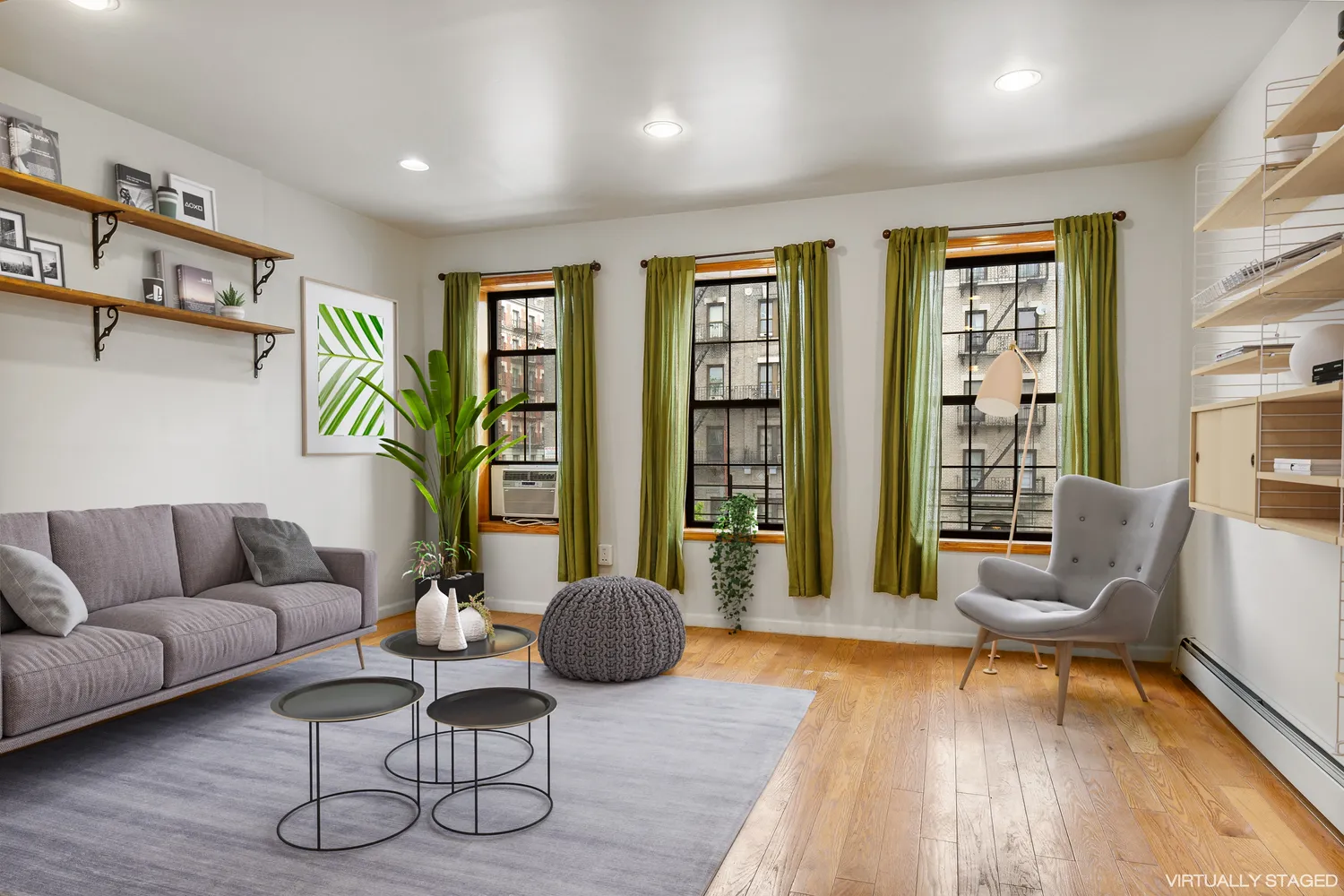a living room with furniture and a rug