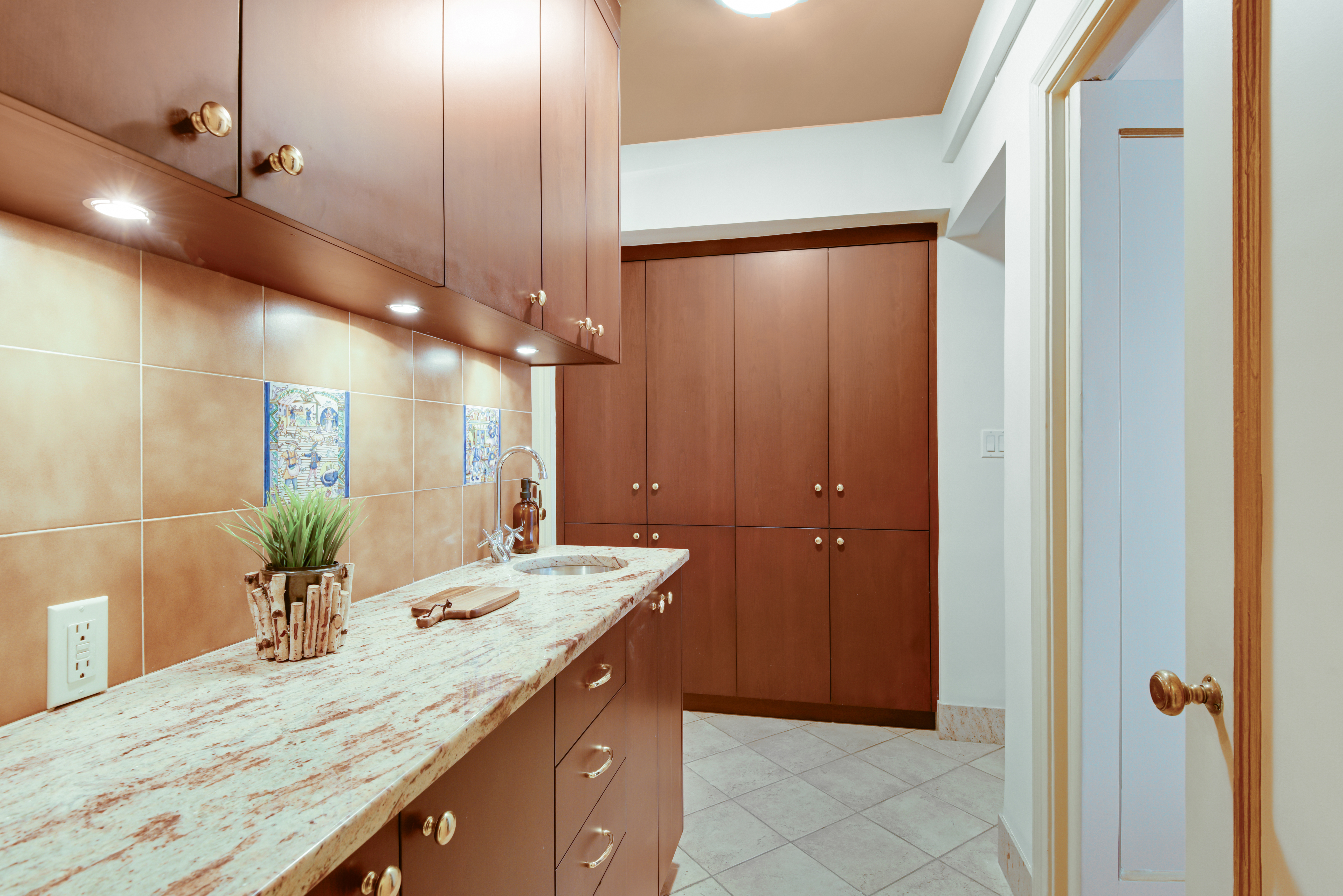 49 East 96th Street, Unit 8/9E Manhattan, NY 10128 - Photo 7 of 17 a bathroom with a granite countertop sink a large mirror and a shower