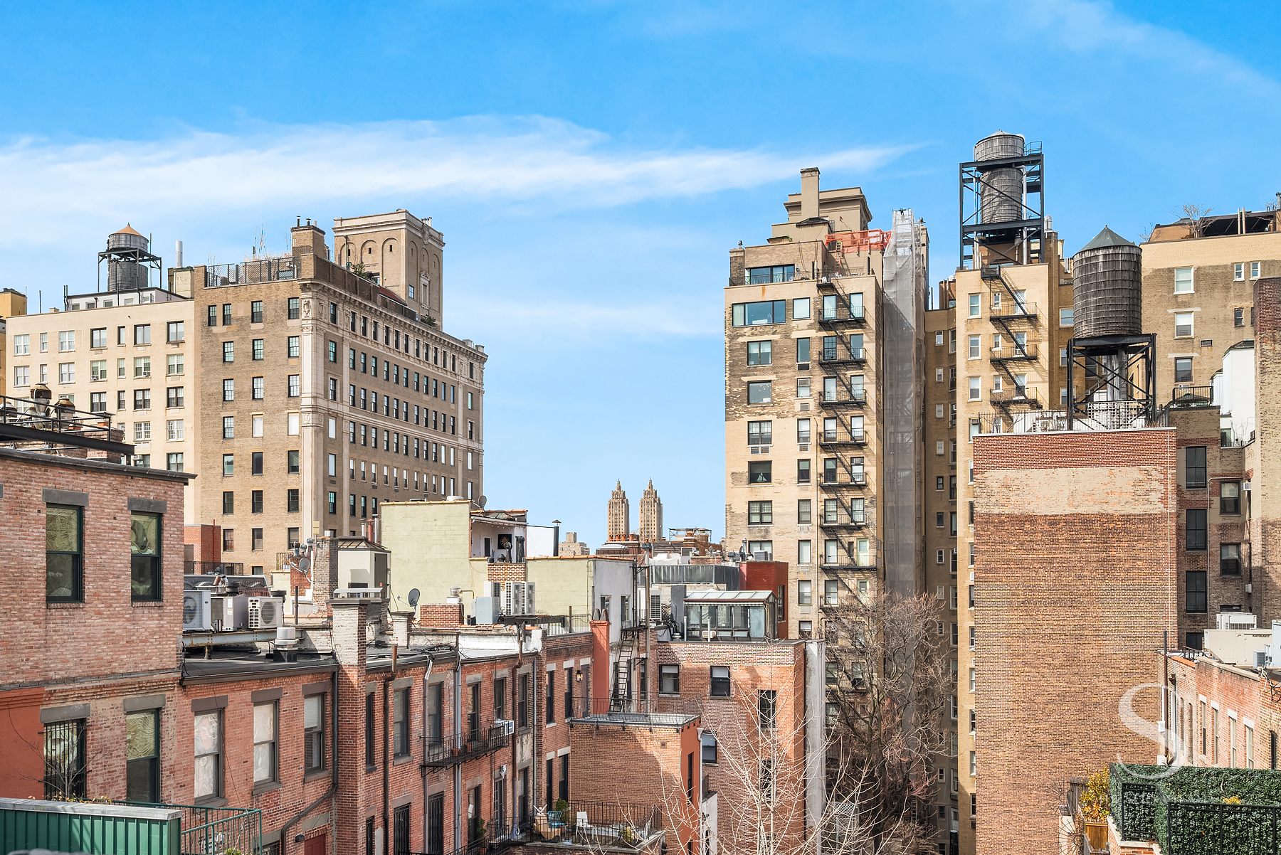 30 East 95th Street, Unit 6F Manhattan, NY 10128 - Photo 4 of 9 a view of a city with tall buildings