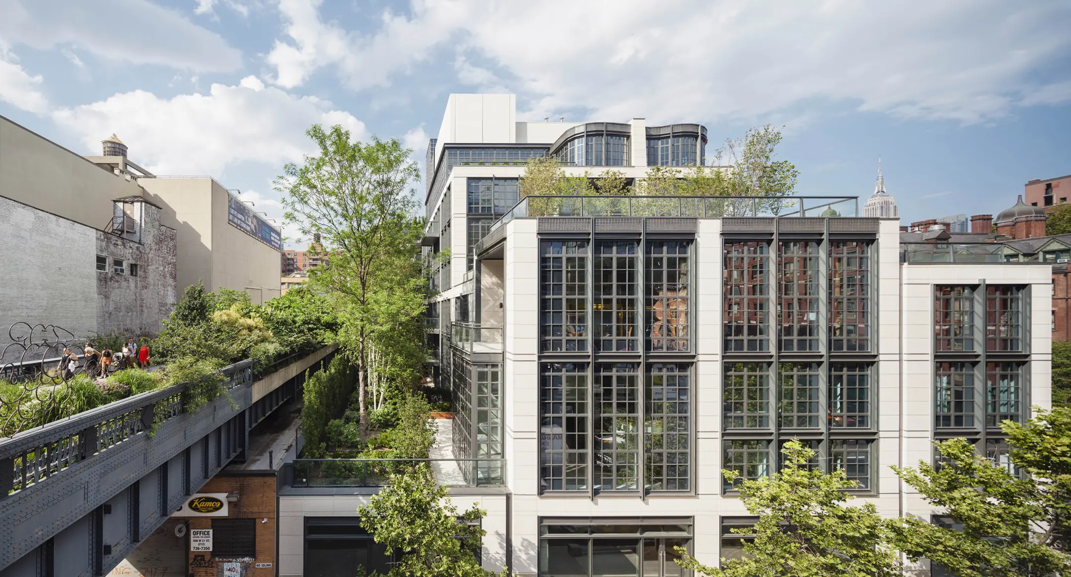 500 West 21st Street, Unit 2G Manhattan, NY 10011 - Photo 13 of 21 a front view of a house with a garden