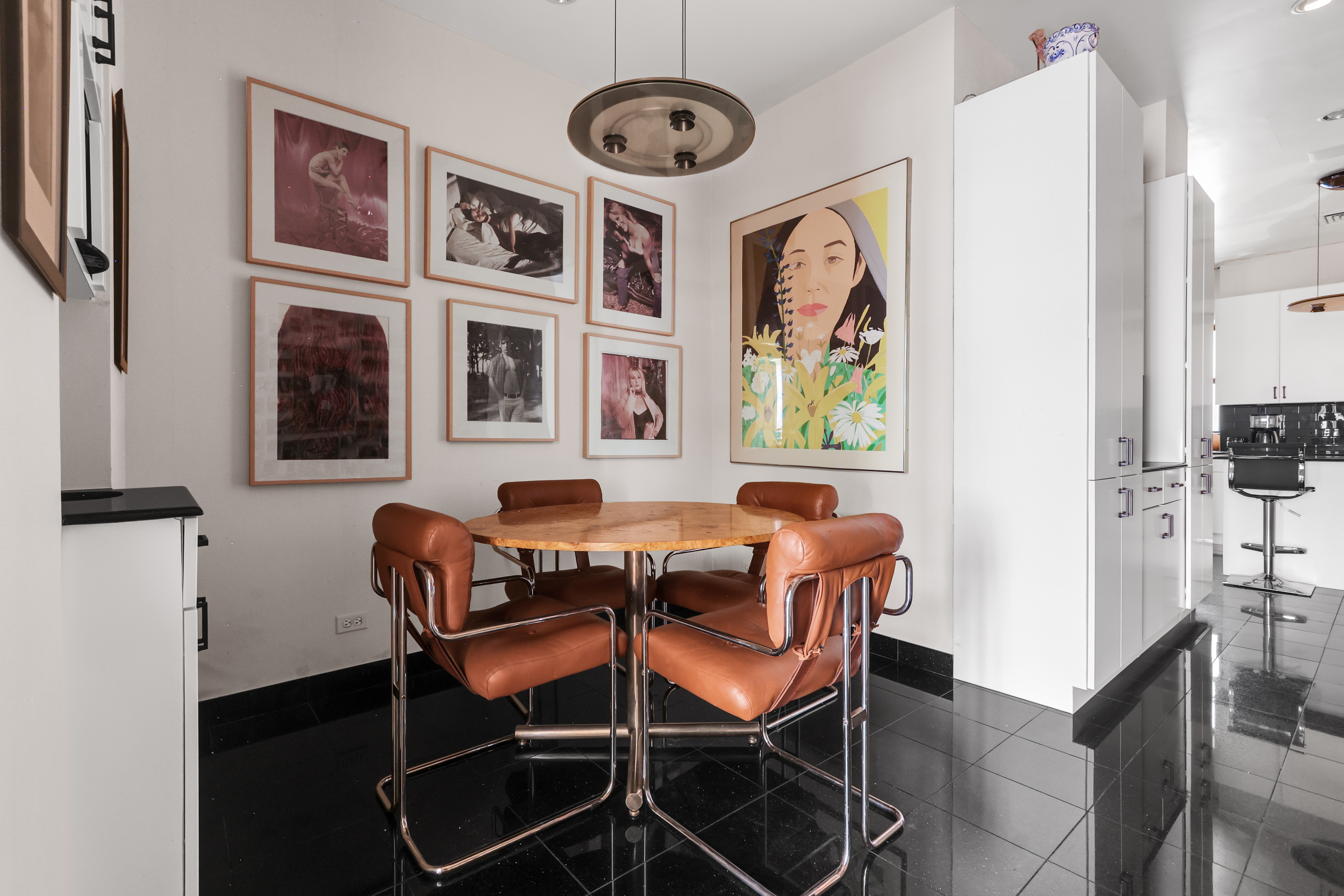 550 Park Avenue, Unit 3W Manhattan, NY 10065 - Photo 10 of 13 a dining room with furniture and window