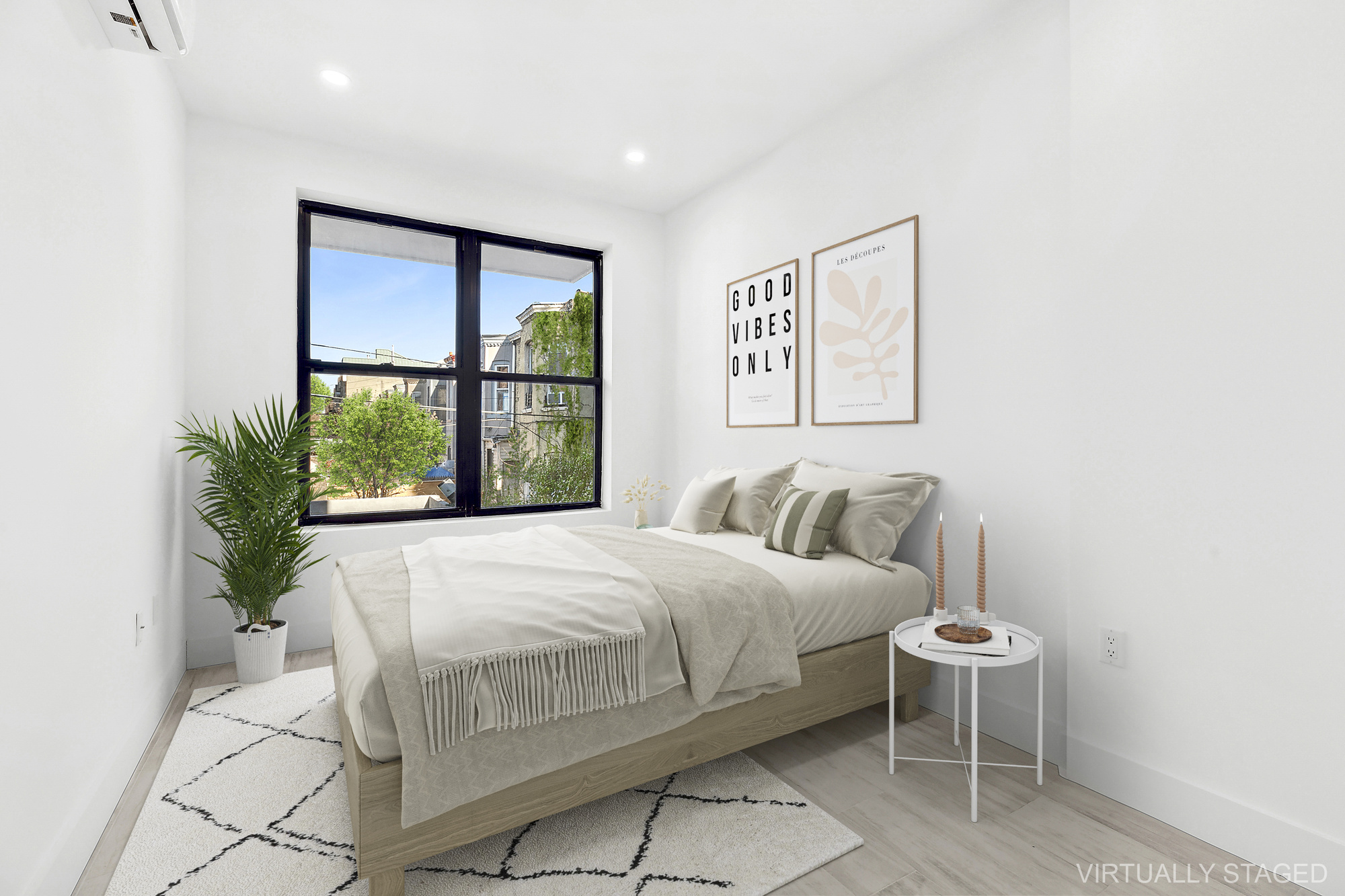 893 Knickerbocker Avenue, Unit 2 Brooklyn, NY 11207 - Photo 6 of 11 a bedroom with a large bed and a large window