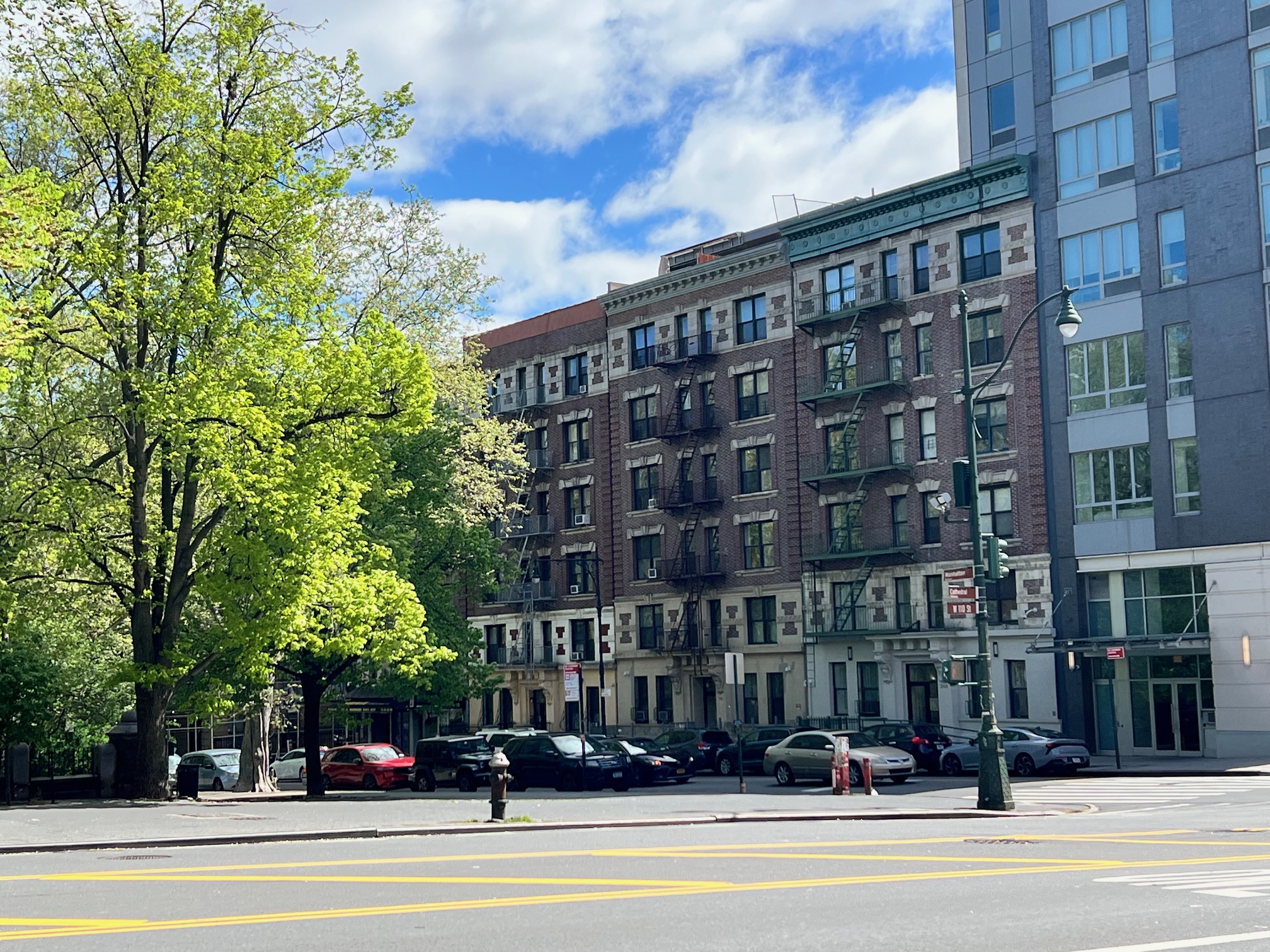 250 Manhattan Avenue, Unit 3A Manhattan, NY 10026 - Photo 14 of 15 a view of a tall building next to a road