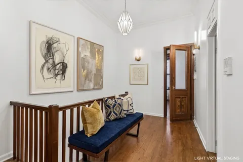 a bedroom with furniture and a window