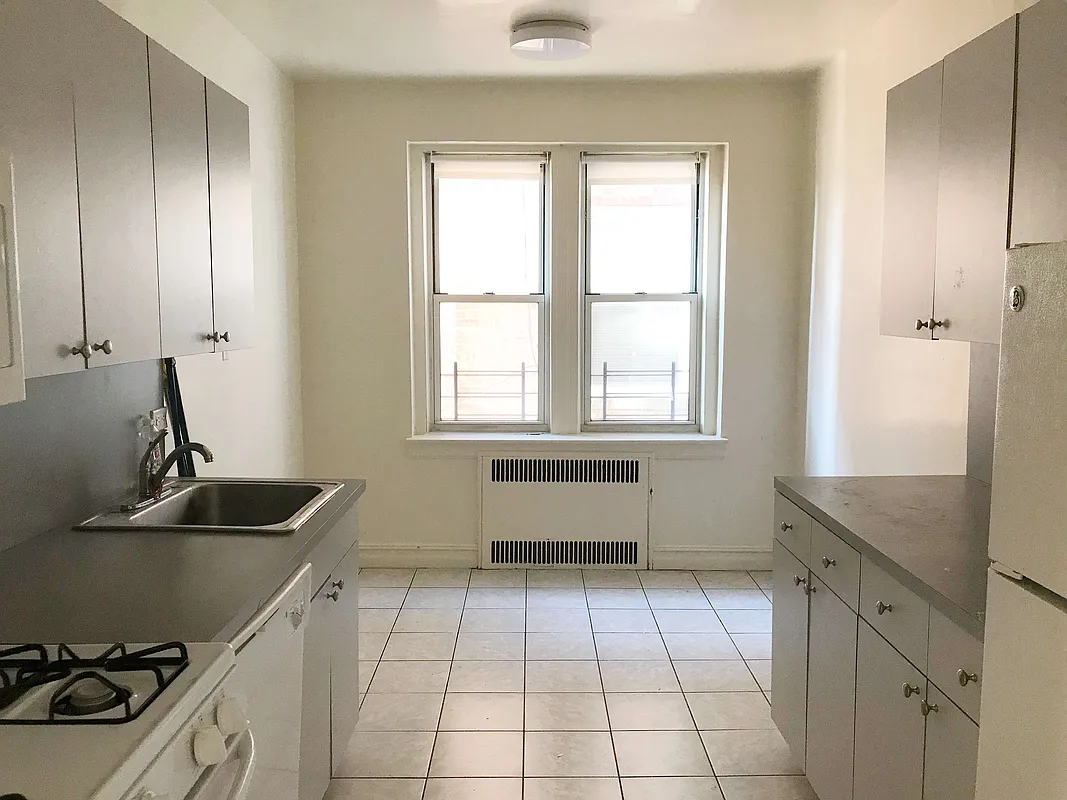 100 Avenue P, Unit 6D Brooklyn, NY 11204 - Photo 1 of 4 a kitchen with a sink and cabinets