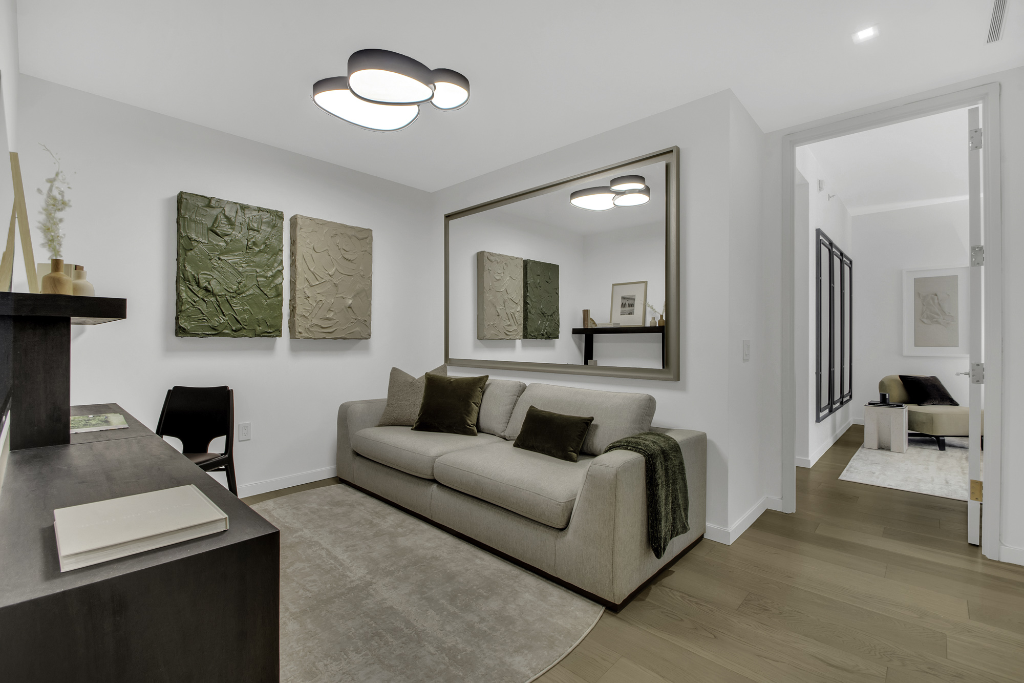 1 West End Avenue, Unit 10A Manhattan, NY 10023 - Photo 18 of 38 a living room with furniture and a mirror