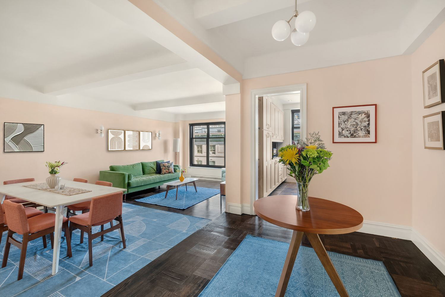 a living room with furniture dining table and a potted plant