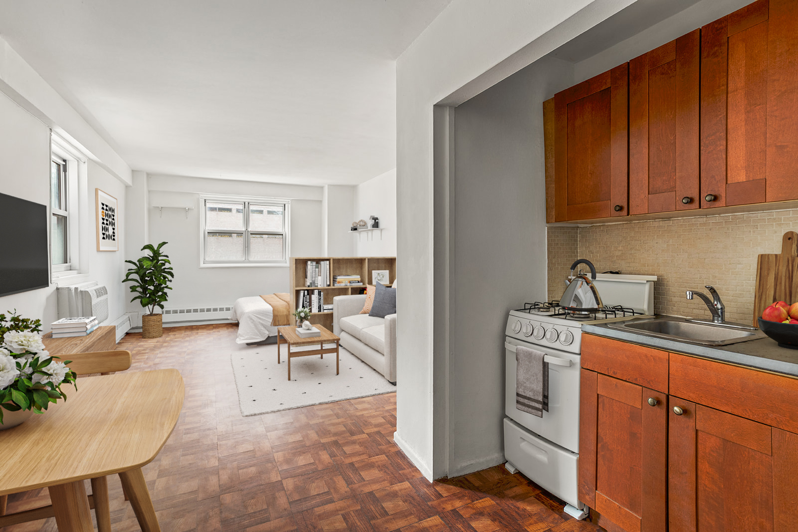 175 Willoughby Street, Unit 6F Brooklyn, NY 11201 - Photo 2 of 11 a living room with furniture a potted plant and kitchen view