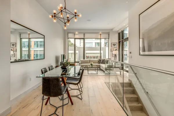 a view of a dining room with furniture window and outside view