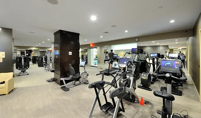 845 United Nations Plaza, Unit 56E Manhattan, NY 10017 - Photo 25 of 28 a view of a room with gym equipment