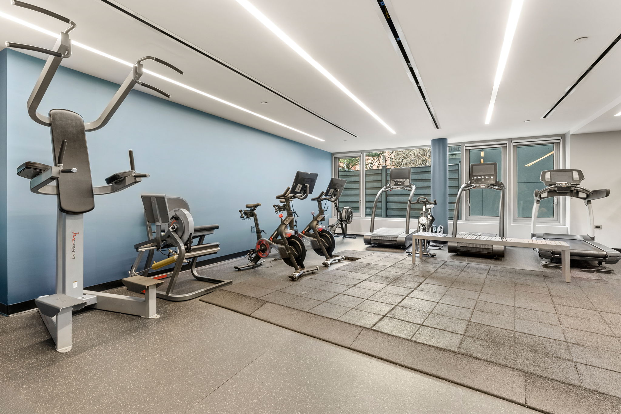 425 West 53rd Street, Unit 416 Manhattan, NY 10019 - Photo 15 of 19 a view of a room with gym equipment