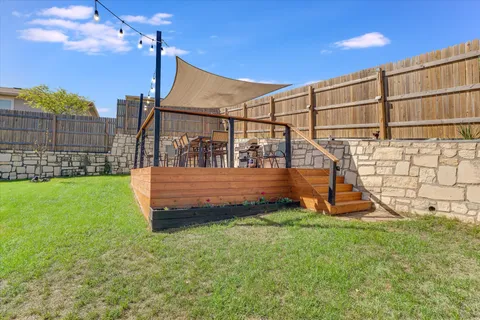 a view of a backyard with a slide