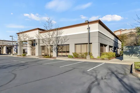 a view of a food mall next to a building
