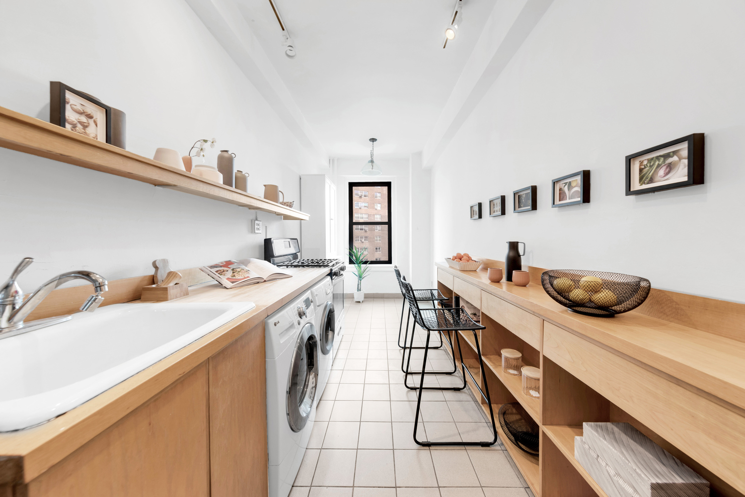 172 East 4th Street, Unit 8F Manhattan, NY 10009 - Photo 7 of 11 a kitchen with a sink and a stove top oven