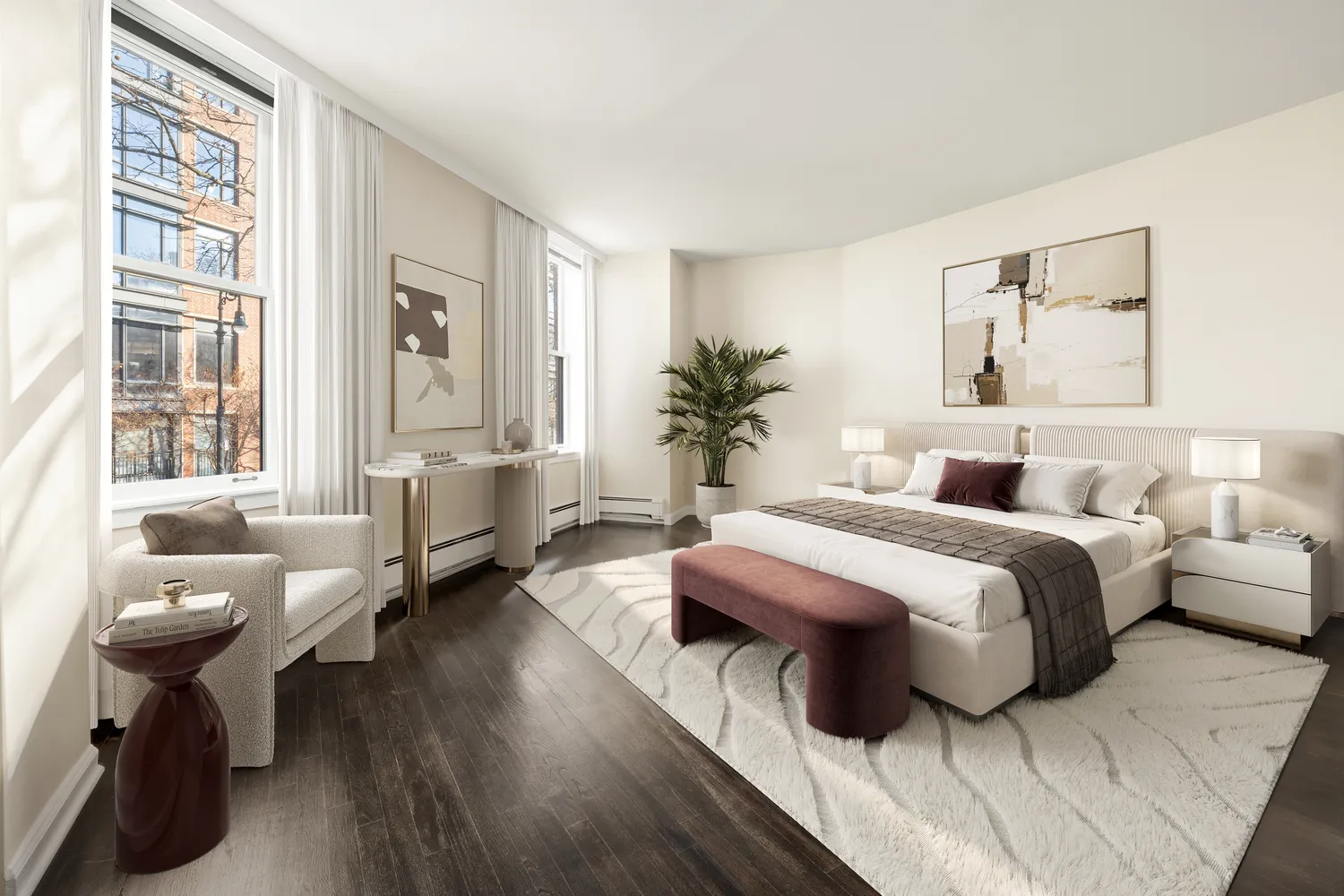 a spacious bedroom with a bed and wooden floor