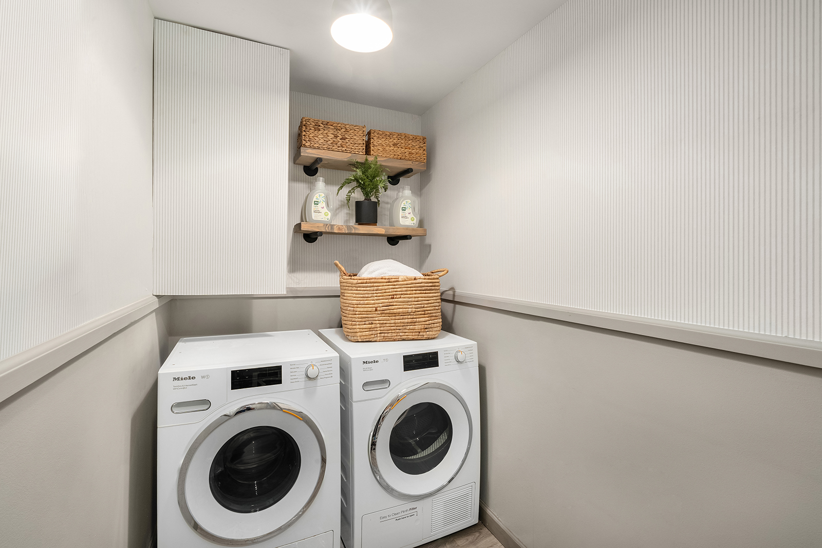 39 North Moore Street, Unit 4A Manhattan, NY 10013 - Photo 15 of 17 a utility room with dryer and washer