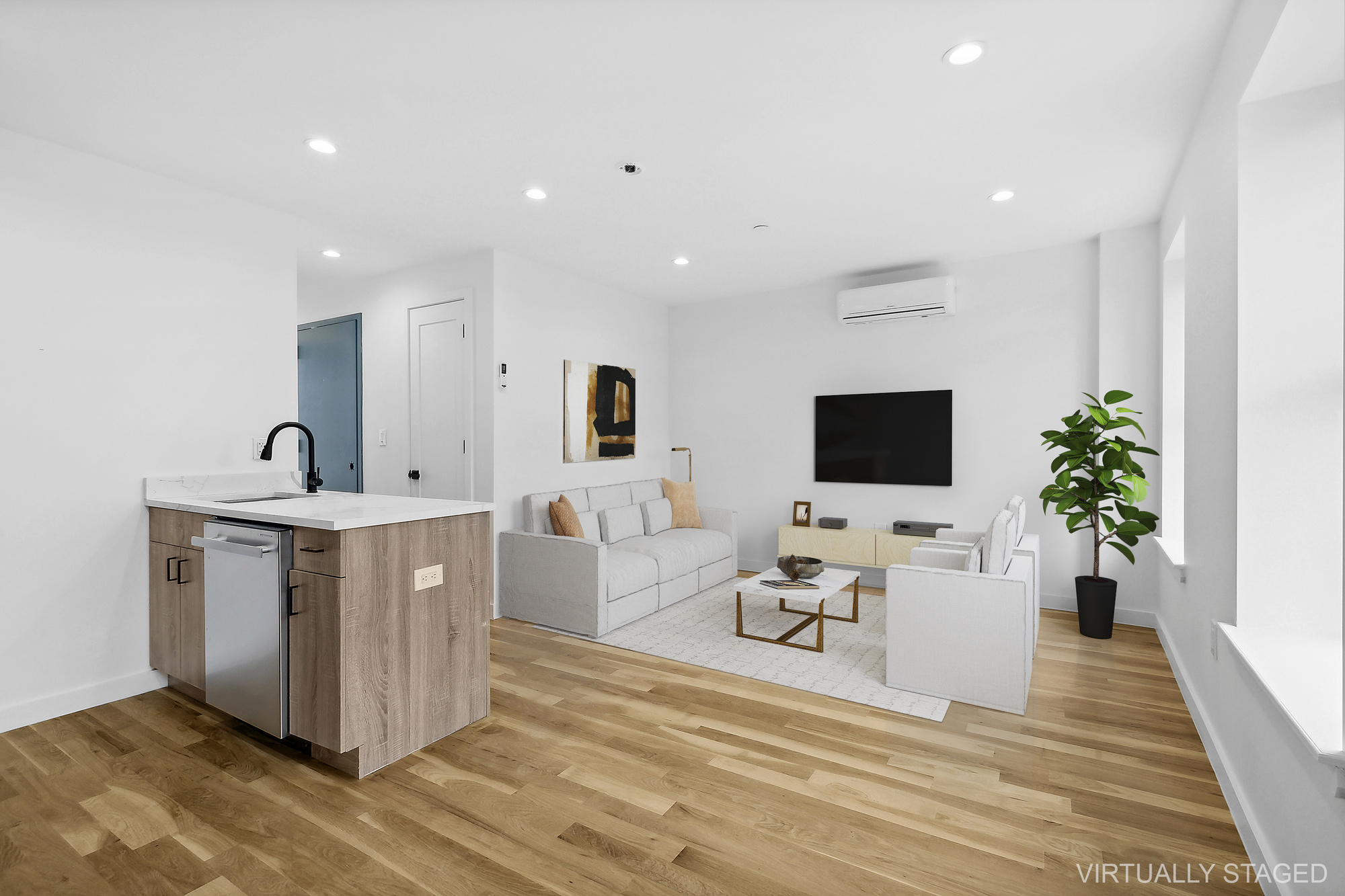 116 Madison Street Brooklyn, NY 11216 - Photo 4 of 20 a view of living room with stainless steel appliances kitchen island sink and living room view