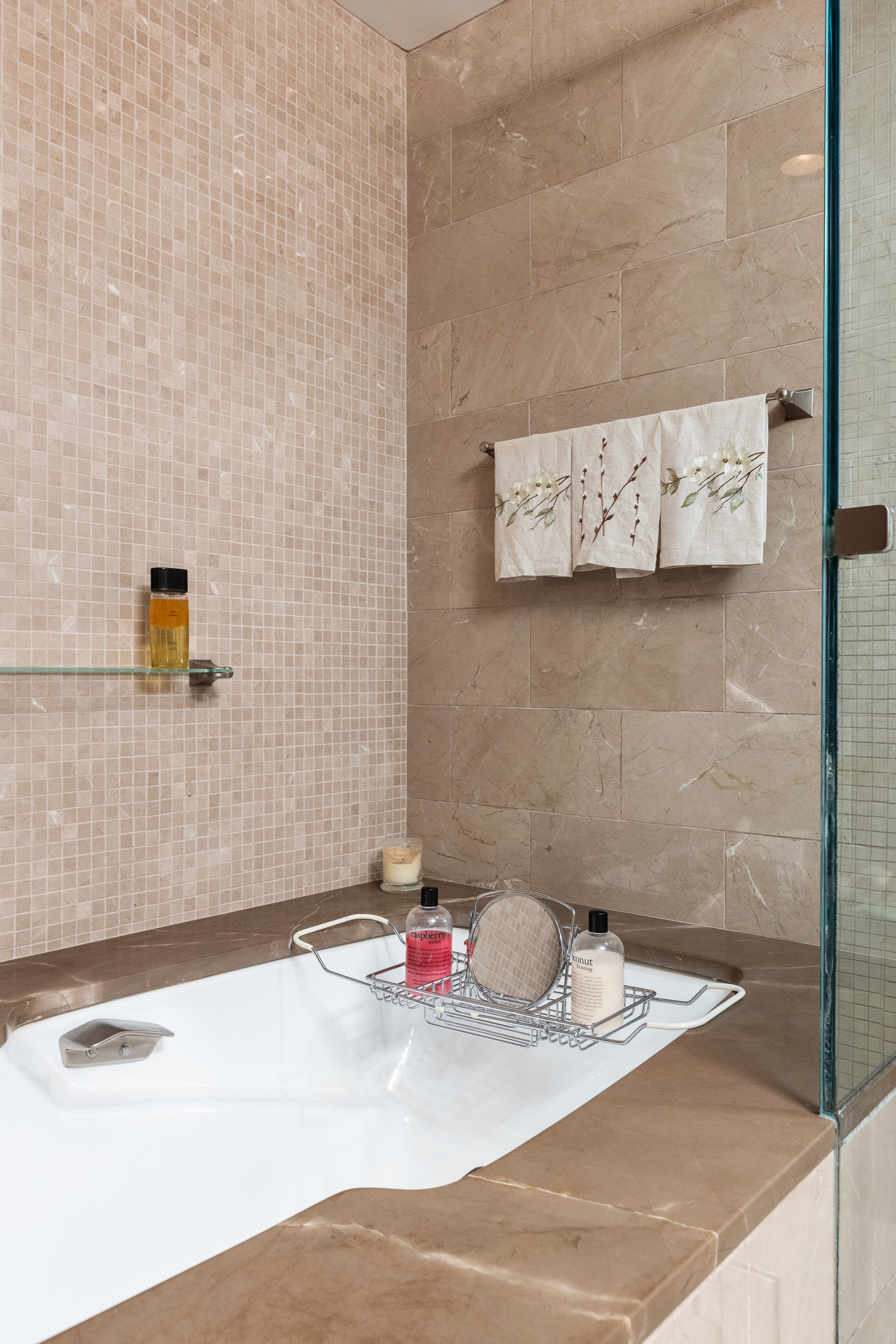 347 West 57th Street, Unit 25AB Manhattan, NY 10019 - Photo 11 of 21 a bathroom with a sink and a shower