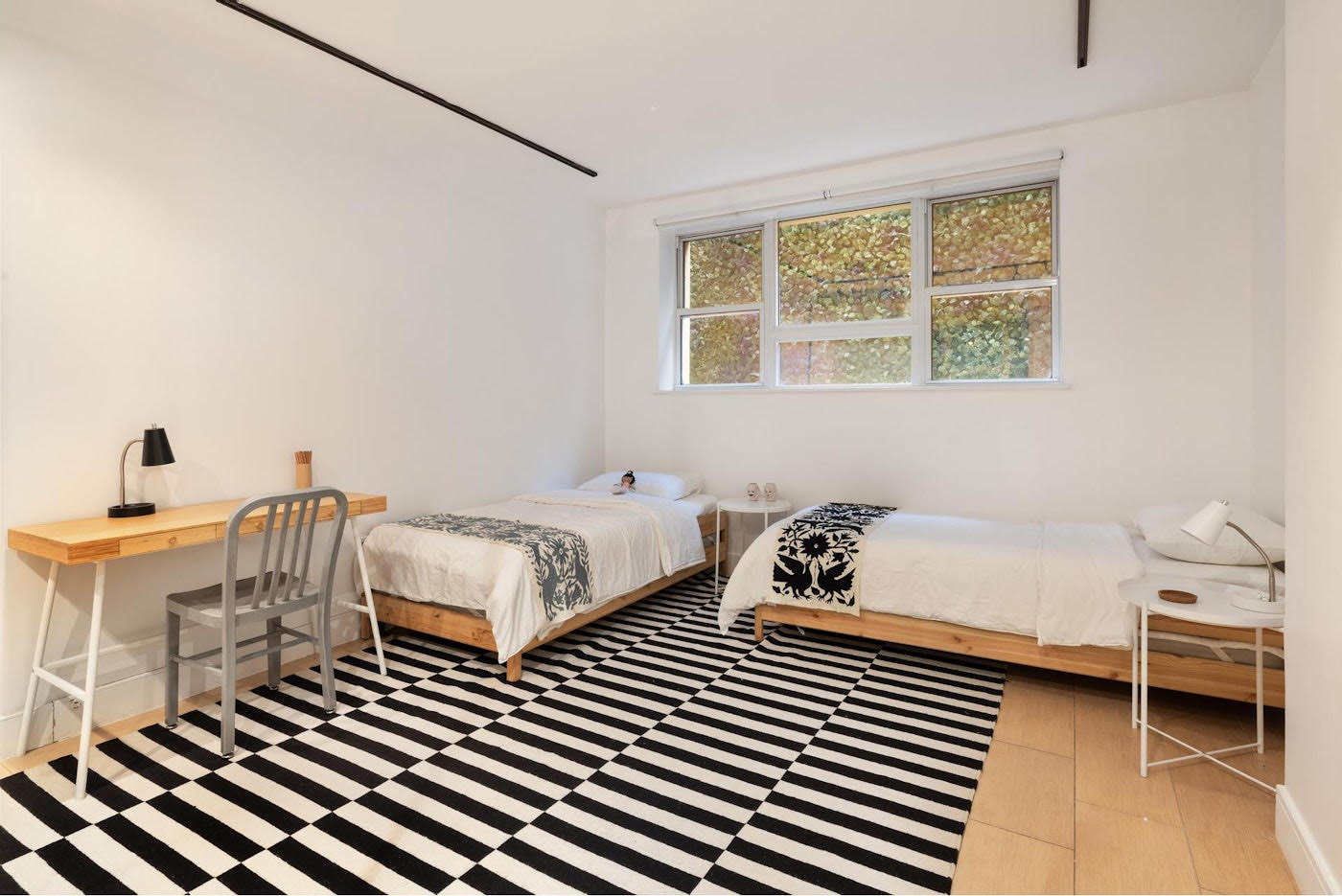 662 Bergen Street, Unit 1A Brooklyn, NY 11238 - Photo 6 of 9 a bedroom with a bed and a window