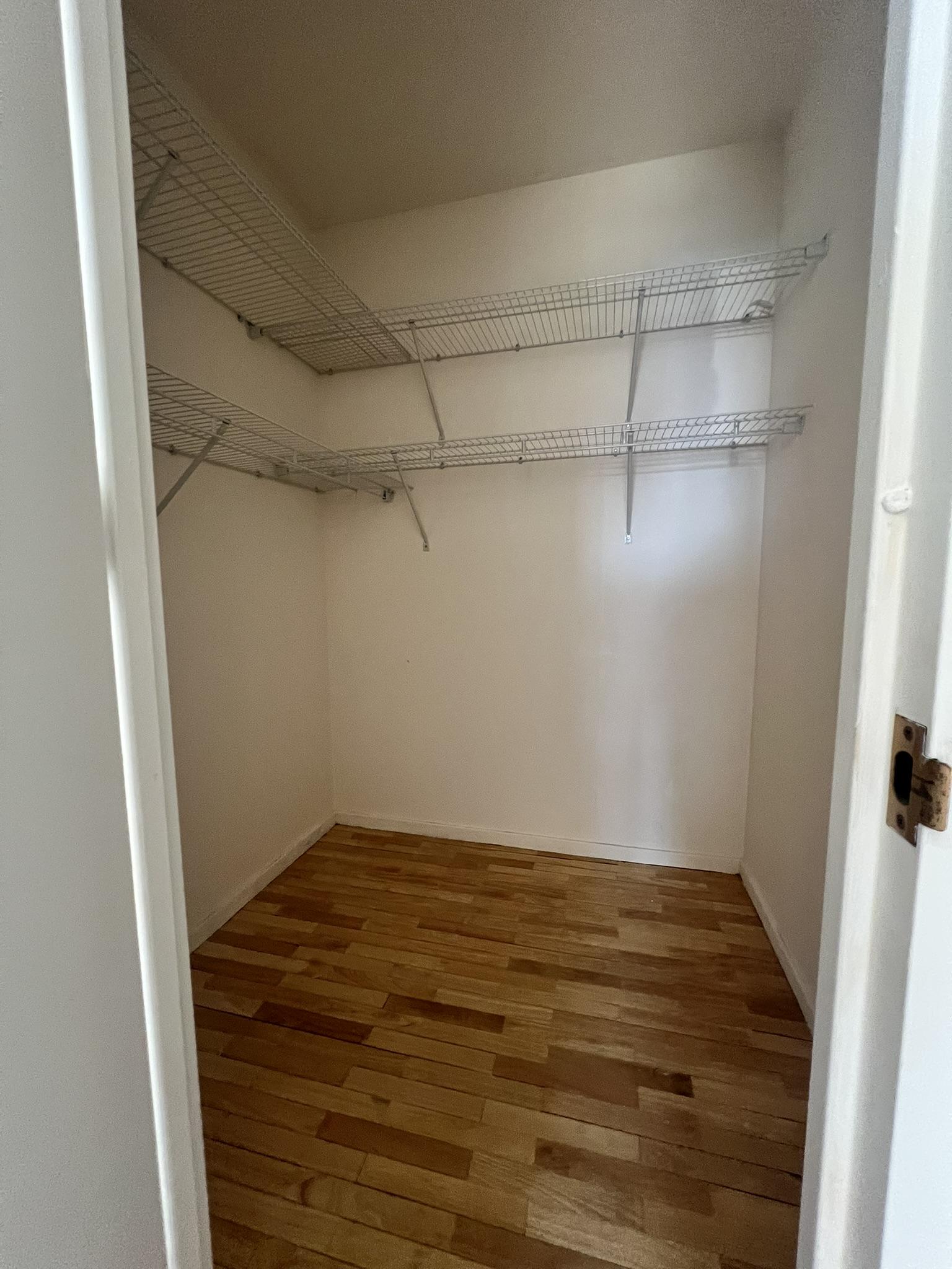 250 West 90th Street, Unit PH2F Manhattan, NY 10024 - Photo 12 of 21 a view of a room with racks on the wall