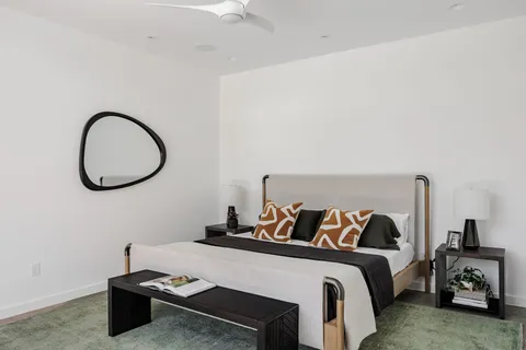 a view of a room with furniture and a potted plant