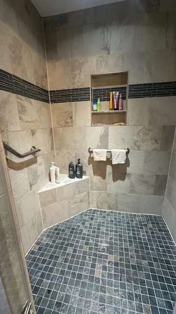 a bathroom with a sink a toilet and bathtub