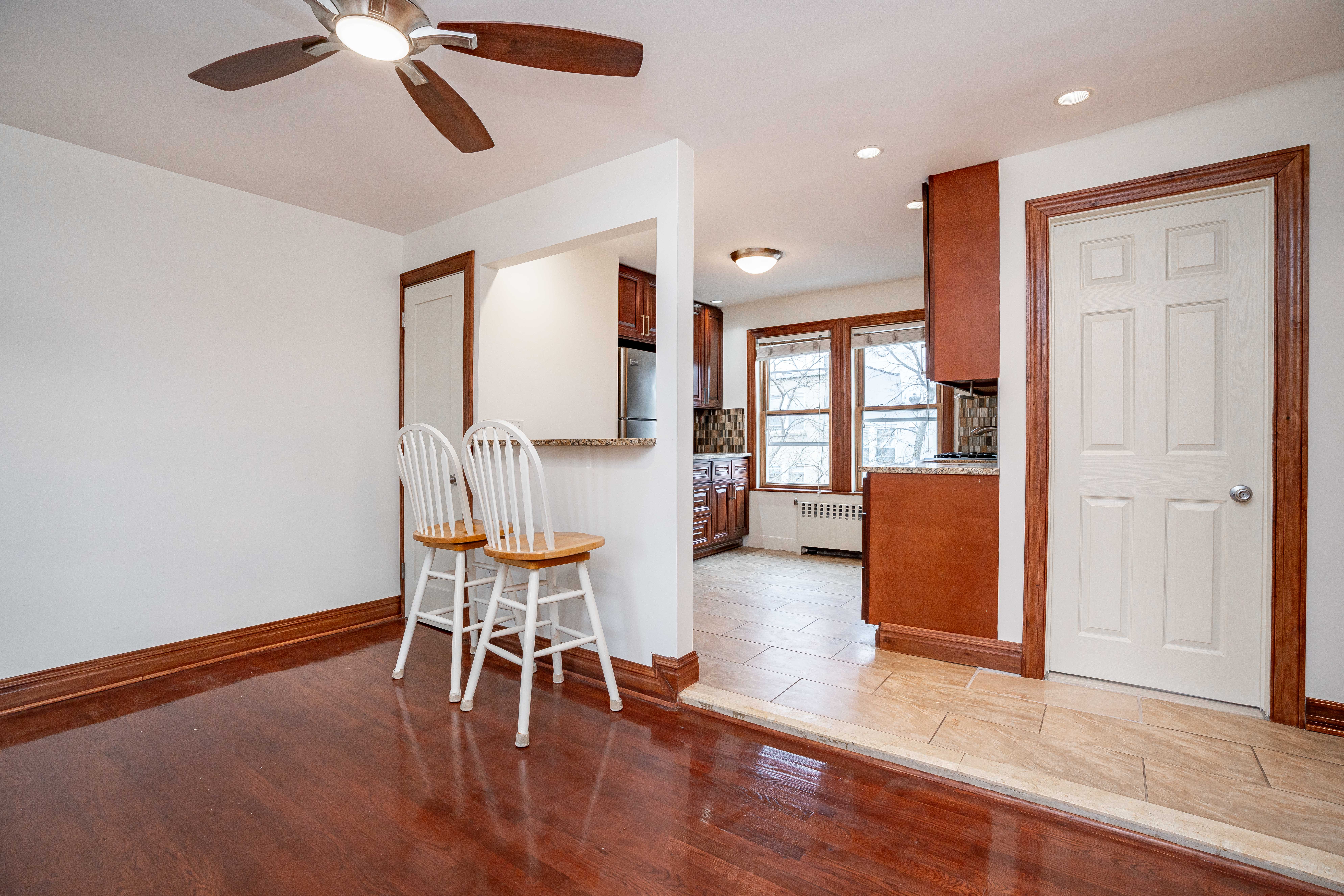 20-60 33rd Street, Unit 2 Queens, NY 11105 - Photo 3 of 10 a living room with furniture and a wooden floor