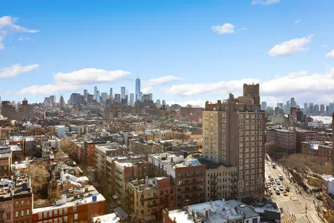 a view of a city with tall buildings
