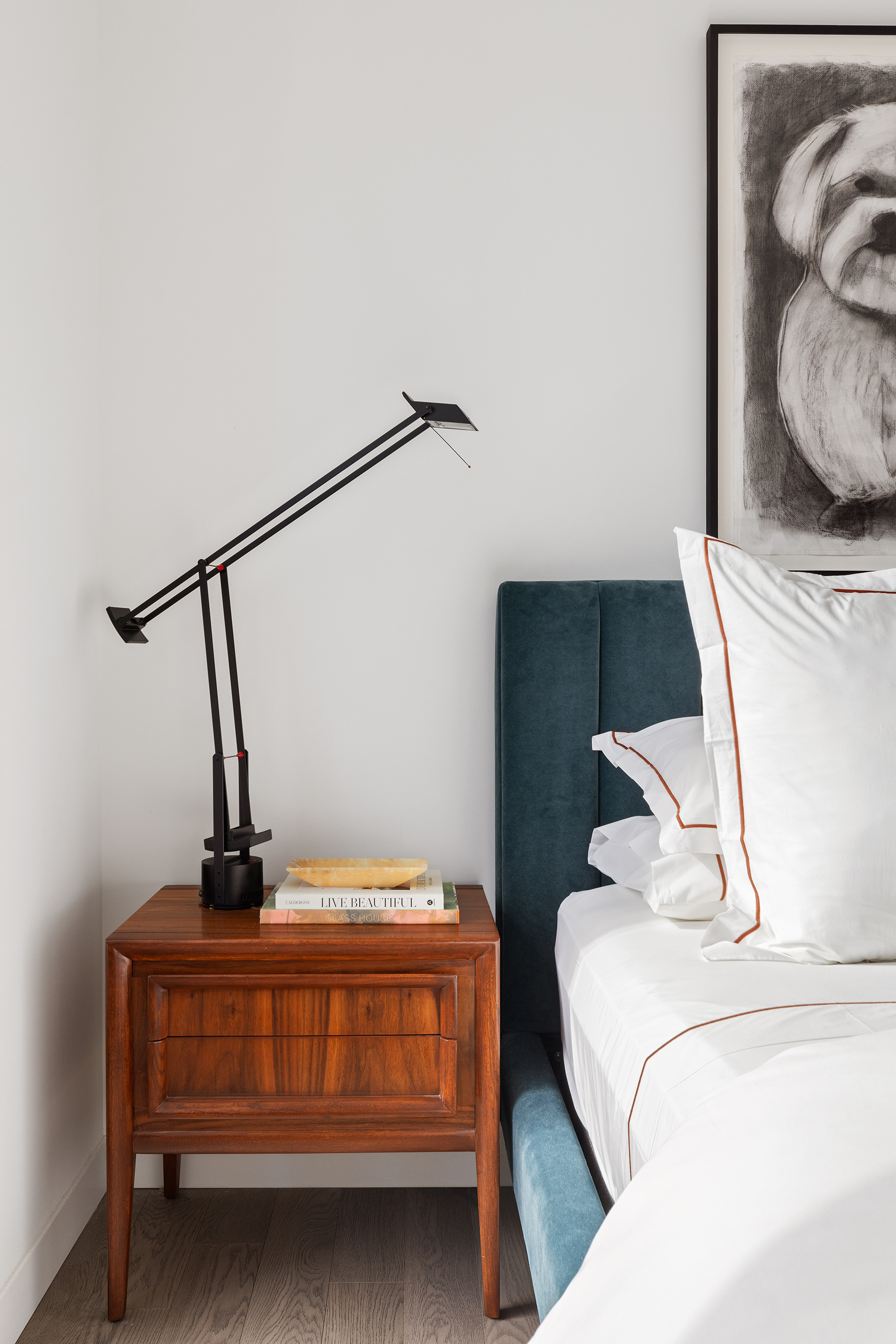 252 South Street, Unit 12N Manhattan, NY 10002 - Photo 7 of 9 a bedroom with a bed and a mirror