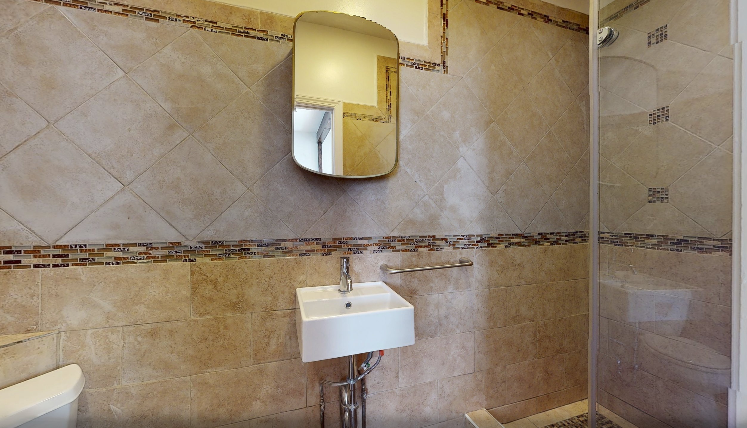 1218 Saint Marks Avenue Brooklyn, NY 11213 - Photo 26 of 42 a bathroom with a shower