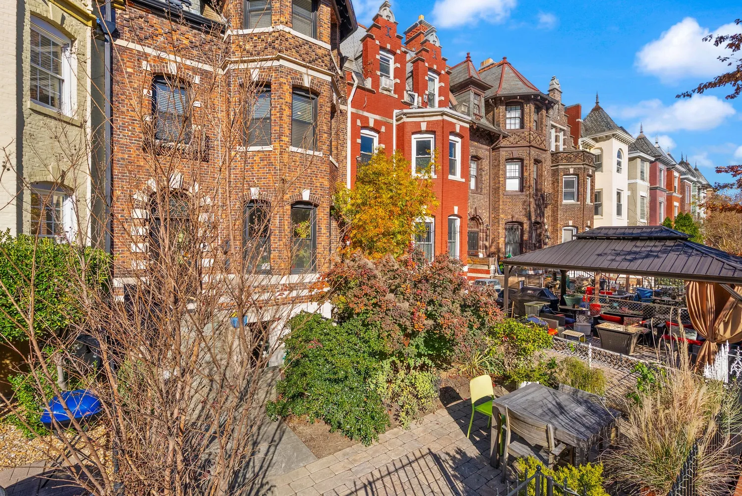 a view of a balcony with a tree