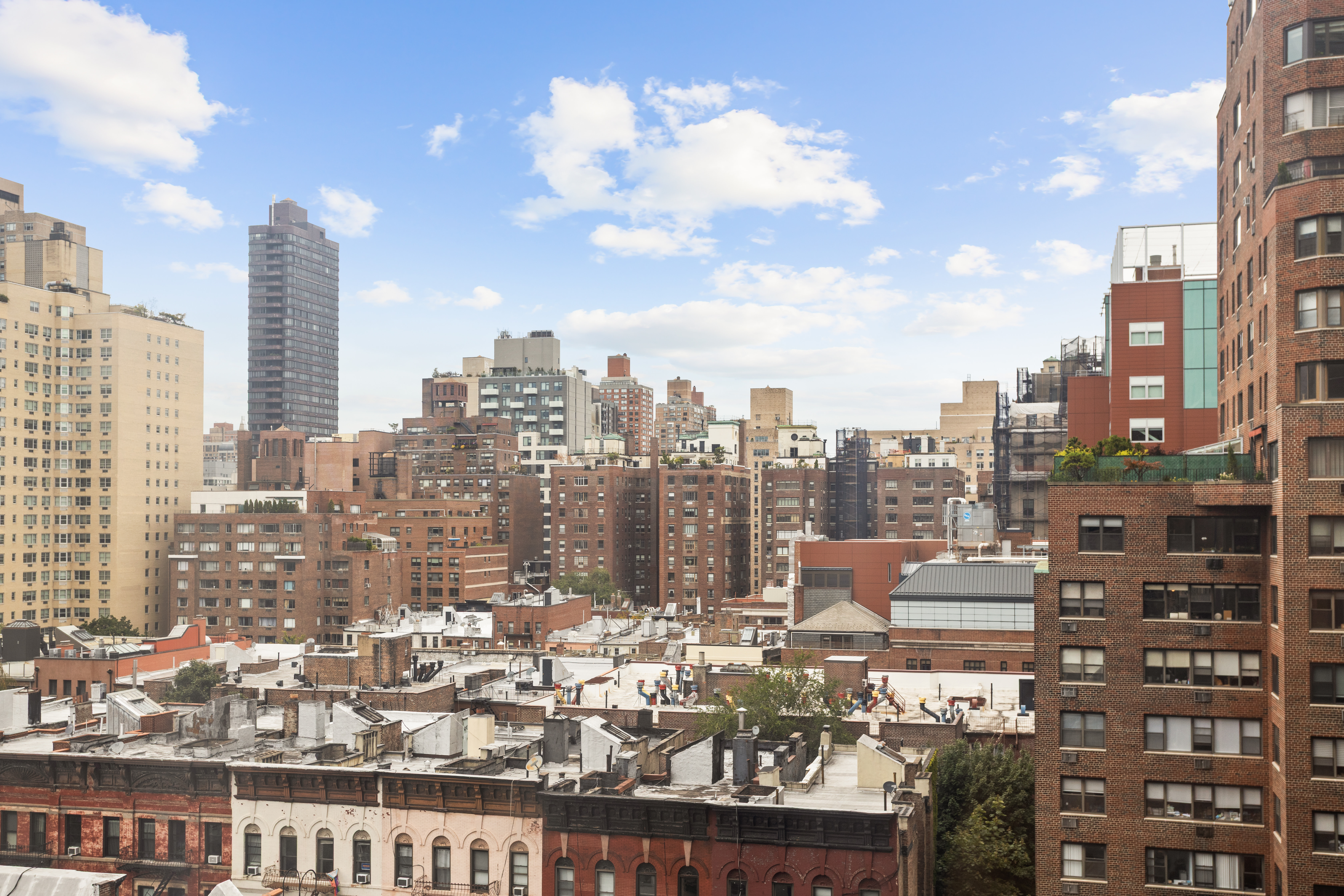 60 East End Avenue, Unit 12C Manhattan, NY 10028 - Photo 21 of 27 a view of a city with tall buildings