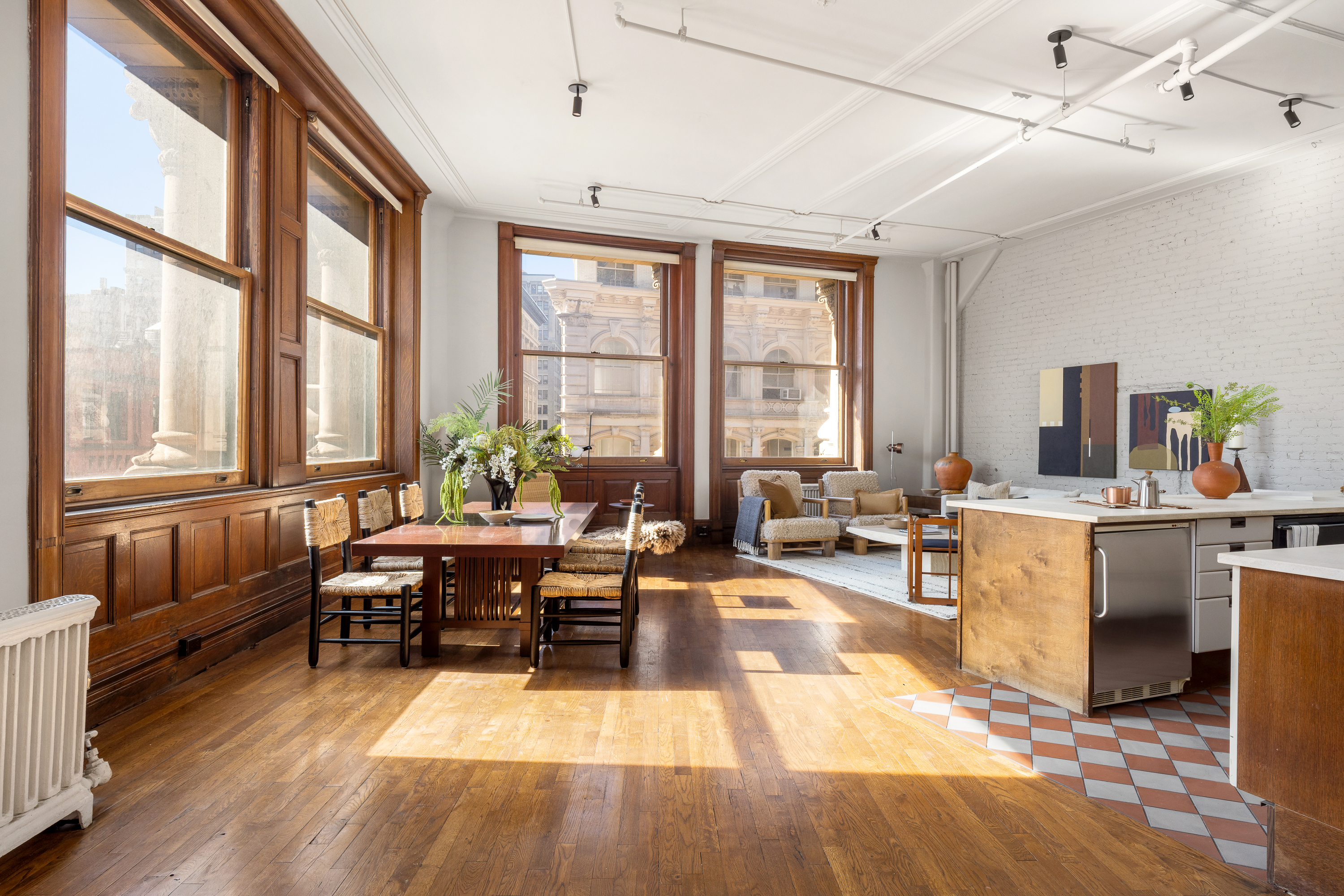 874 Broadway, Unit 501 Manhattan, NY 10003 - Photo 5 of 17 a living room with patio furniture and floor to ceiling windows