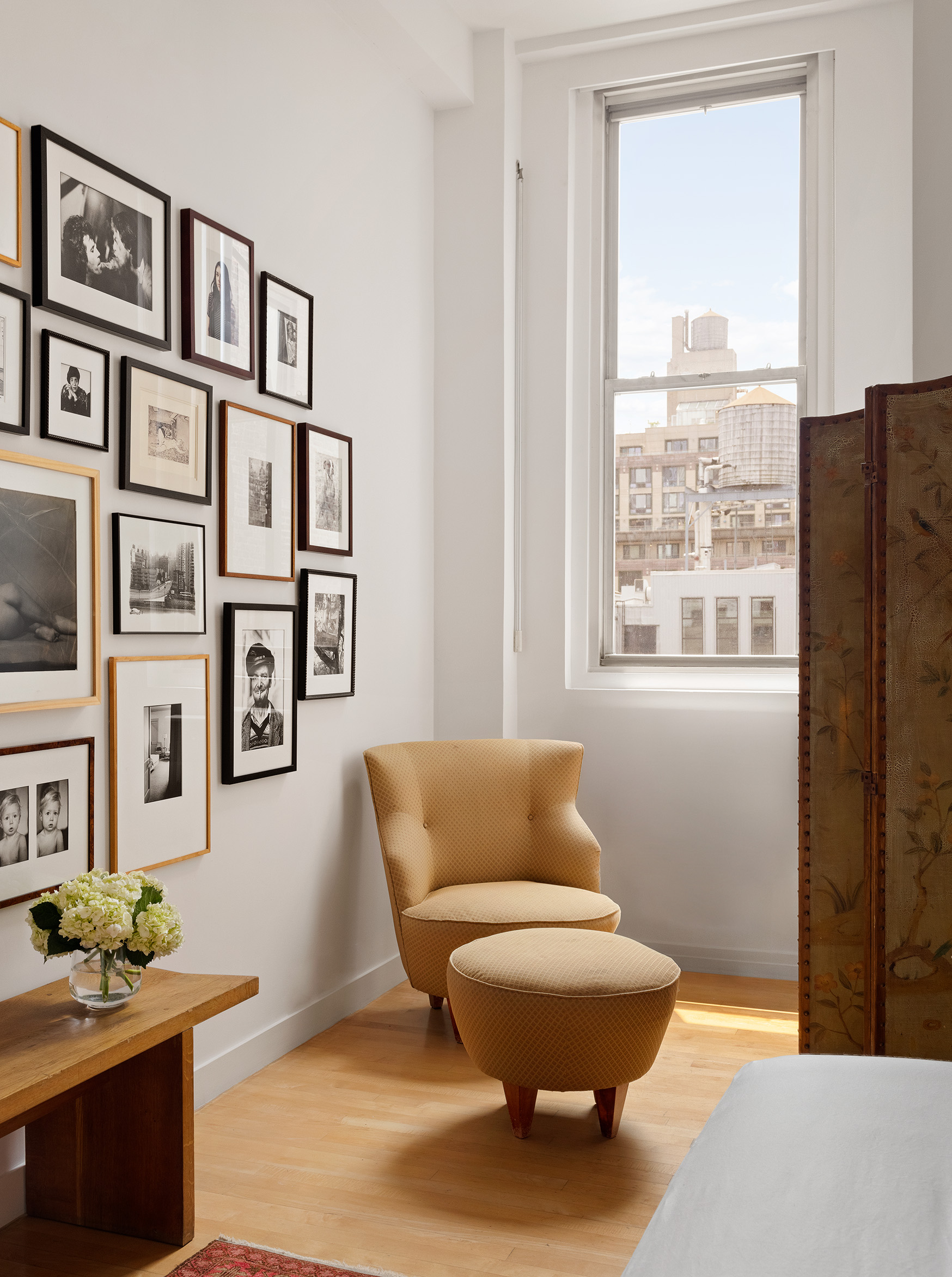 32 West 20th Street, Unit 9B Manhattan, NY 10011 - Photo 8 of 16 a living room with furniture and a window