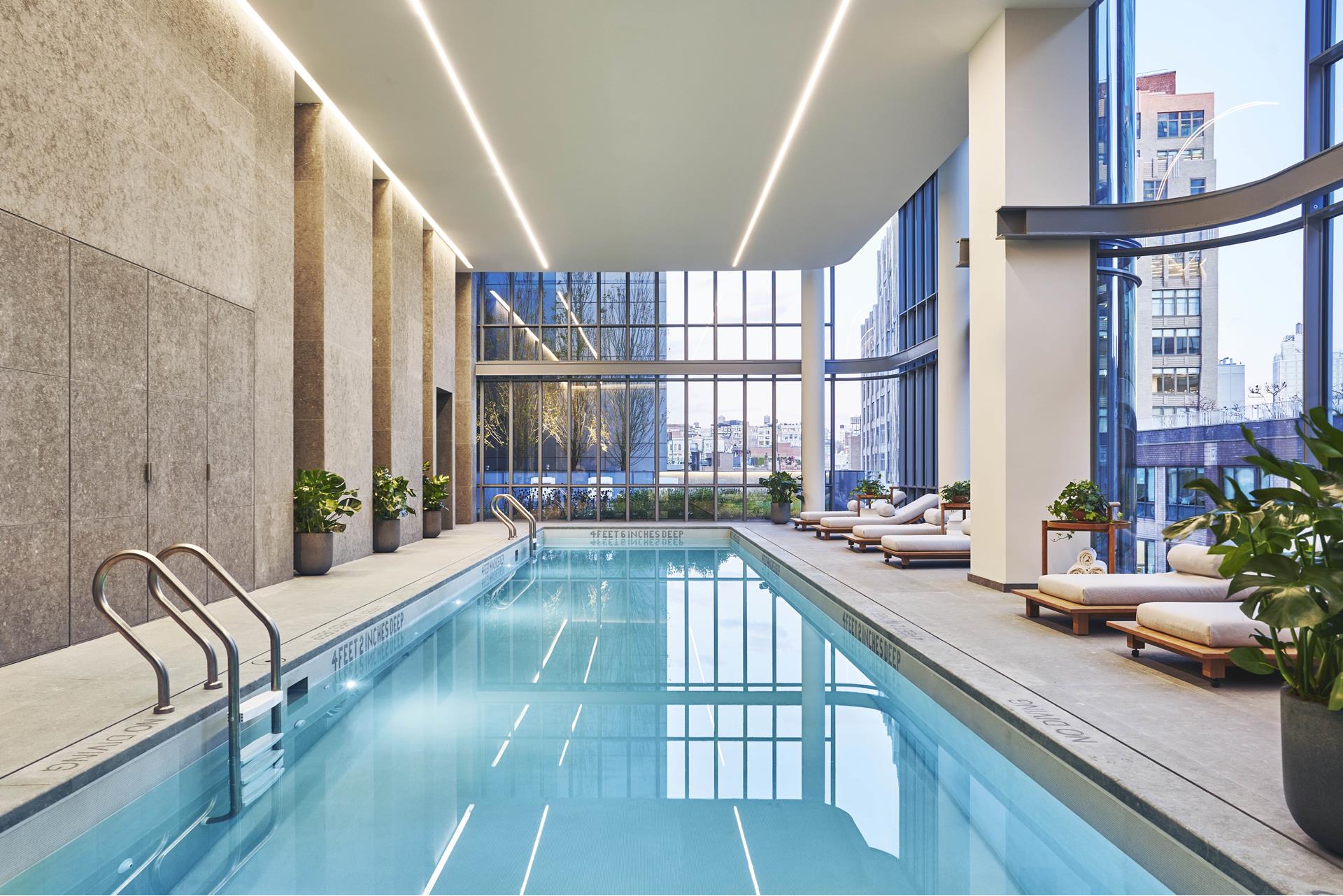 565 Broome Street, Unit N12E Manhattan, NY 10013 - Photo 11 of 19 a view of swimming pool with outdoor seating