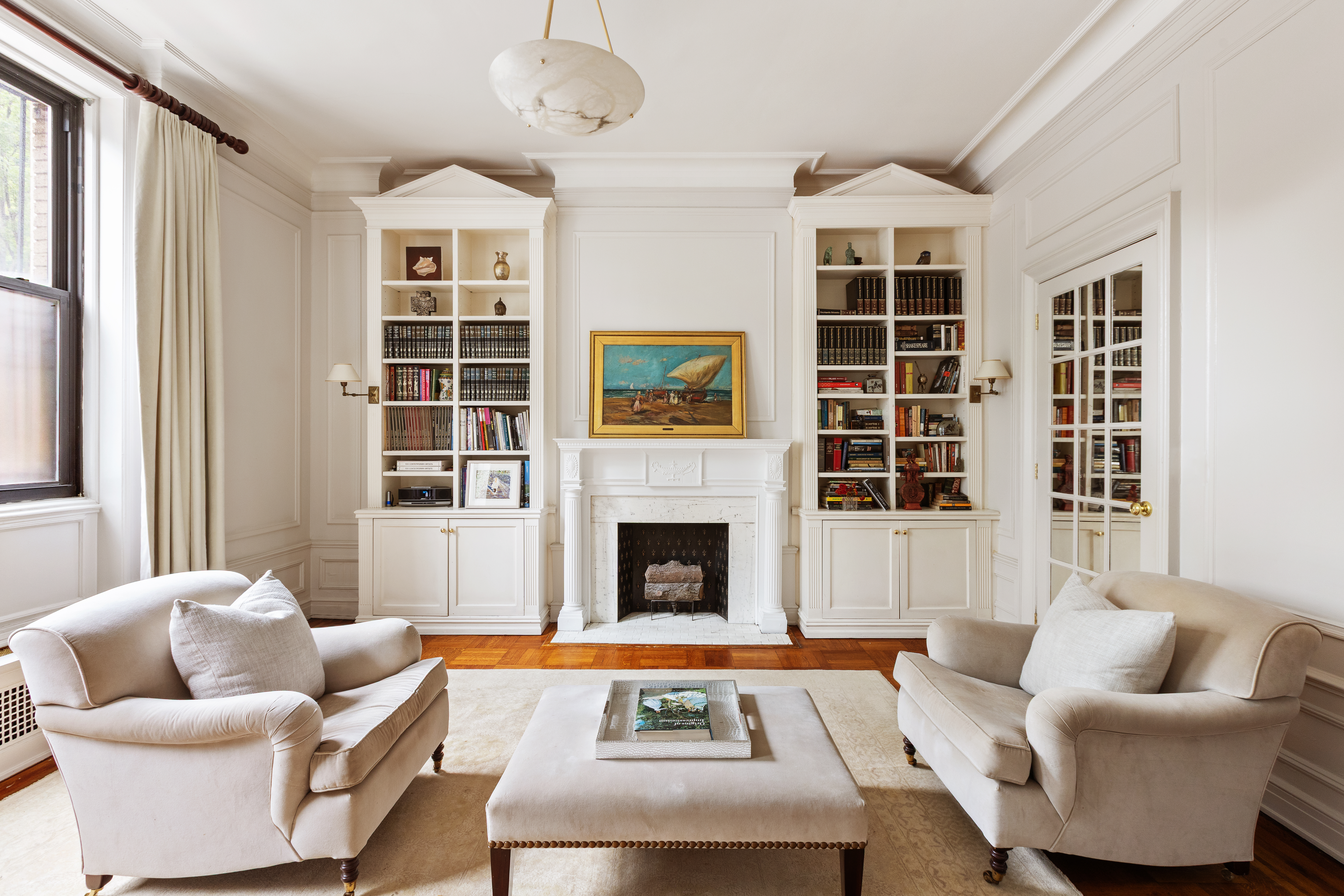 271 Central Park West, Unit 1D Manhattan, NY 10024 - Photo 3 of 12 a living room with furniture and a fireplace