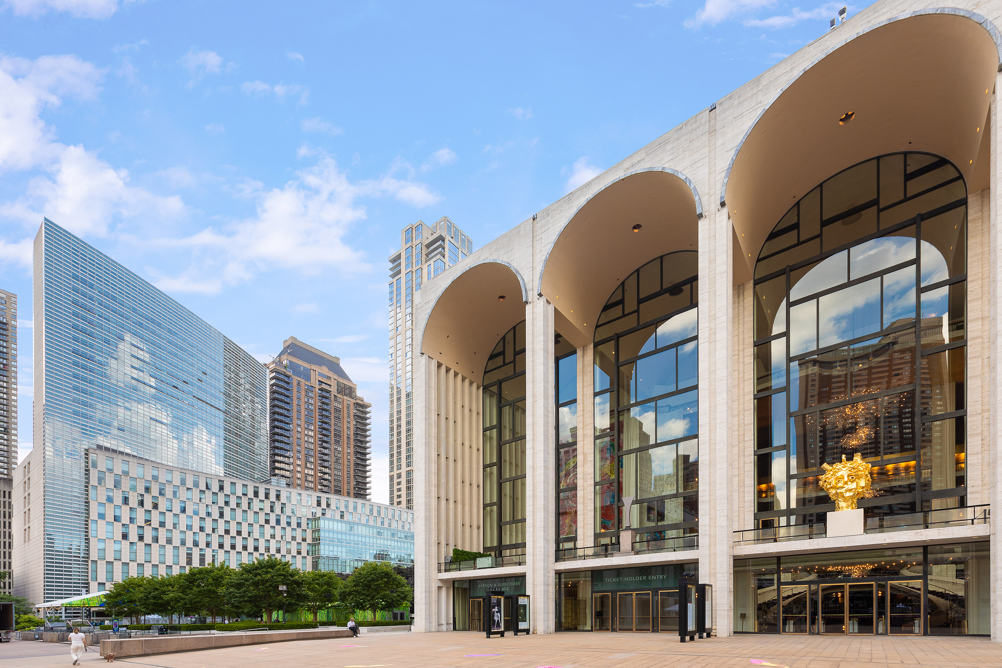 161 West 61st Street, Unit 5C Manhattan, NY 10023 - Photo 23 of 30 a view of a brick building next to a yard