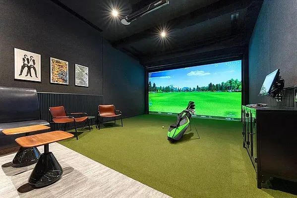 a living room with furniture pool table and a fireplace