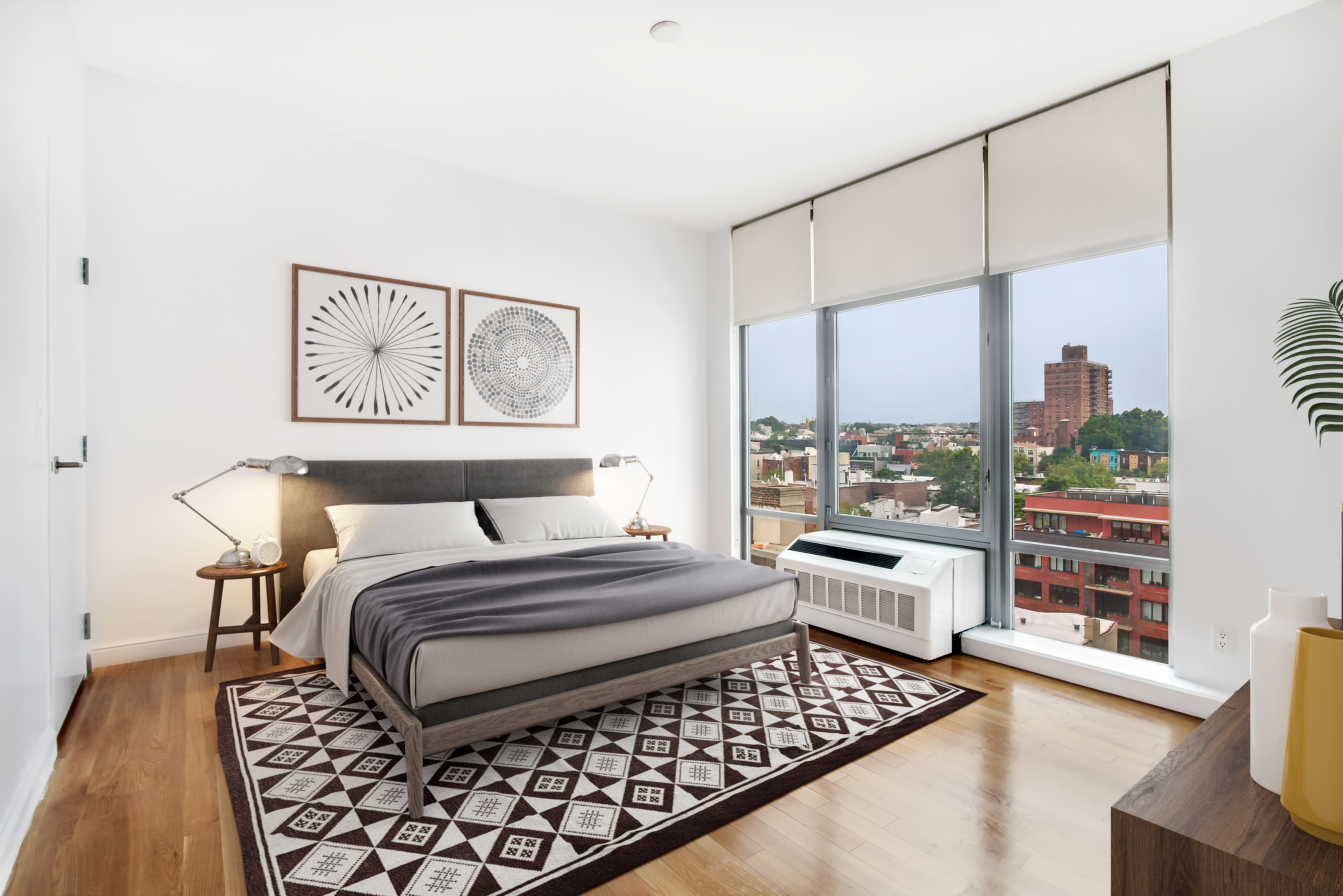 267 6th Street, Unit 7K Brooklyn, NY 11215 - Photo 4 of 17 a bedroom with a large bed and a couch