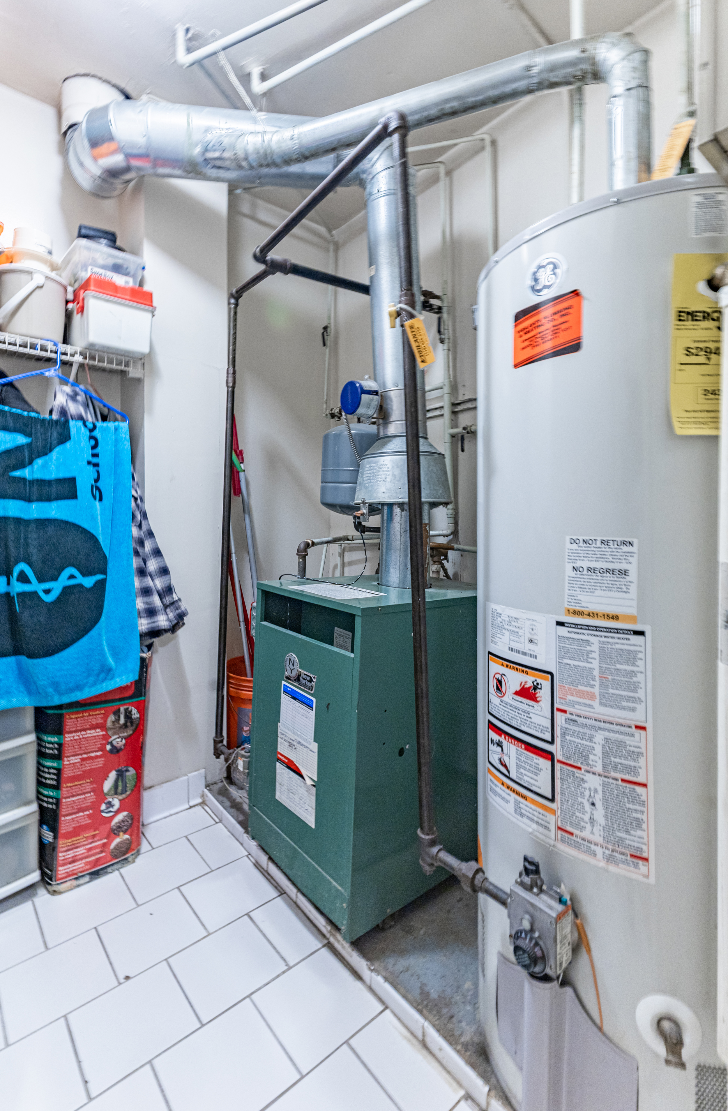 669 Dekalb Avenue Brooklyn, NY 11216 - Photo 17 of 21 a utility room with dryer and washer