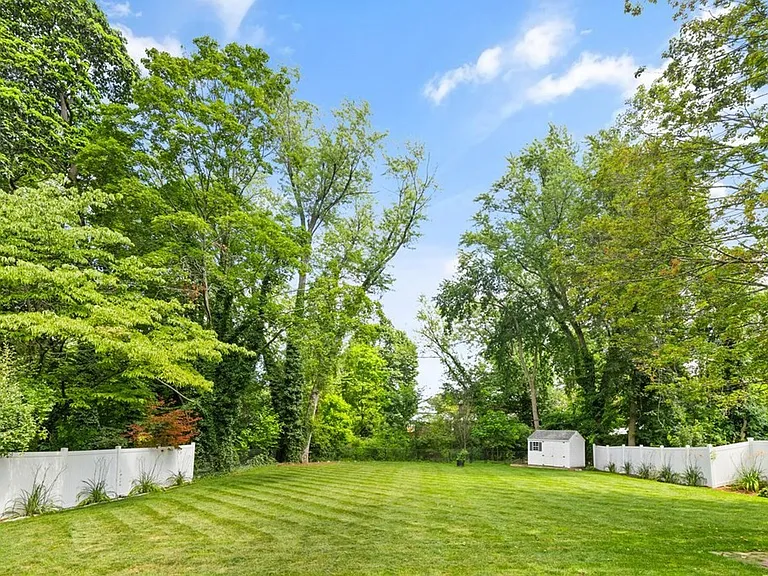 288 Albion Street Wakefield, MA 01880 - Photo 7 of 8 a view of a backyard with large trees