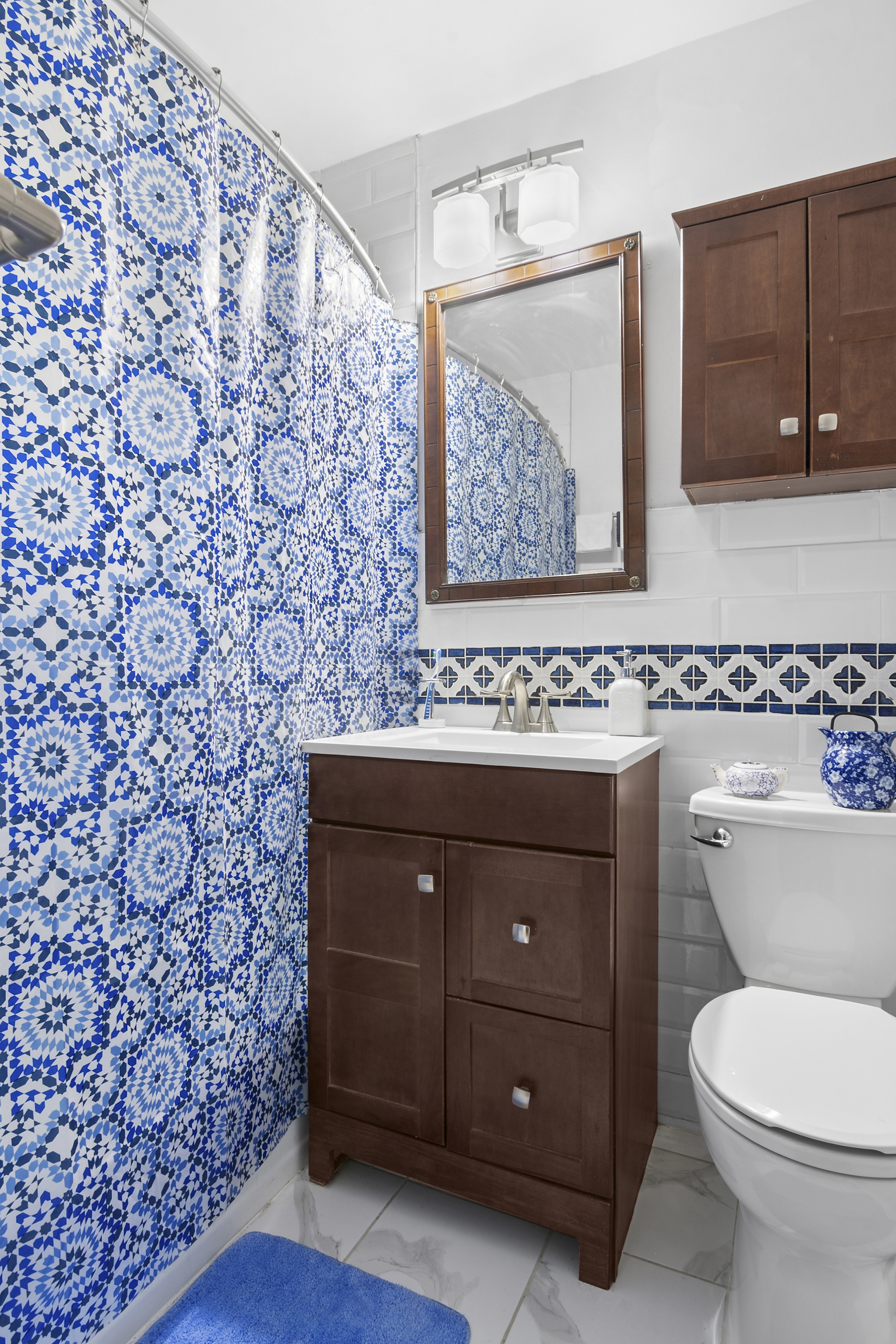 195 Willoughby Avenue, Unit 518 Brooklyn, NY 11205 - Photo 6 of 7 a bathroom with a toilet and a sink