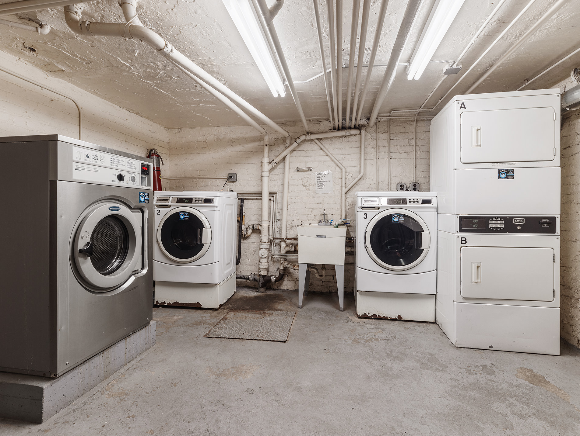 2116 Dorchester Road, Unit 1I Brooklyn, NY 11226 - Photo 13 of 15 a utility room with dryer and washer